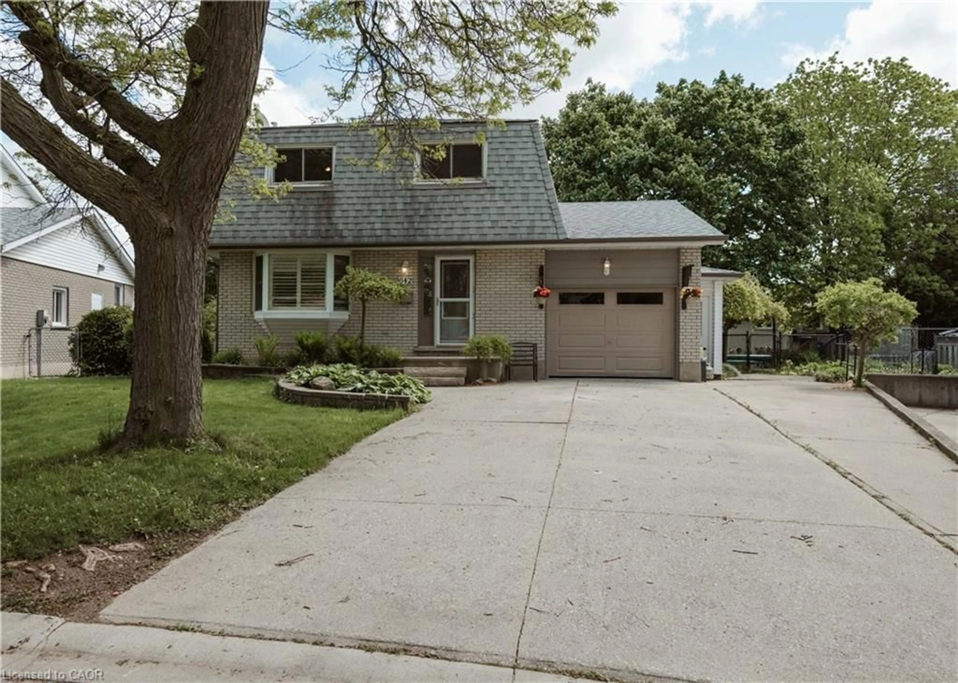 Home with vinyl exterior material, street for 642 Cedargrove Pl, Waterloo Ontario N2L 4Y9