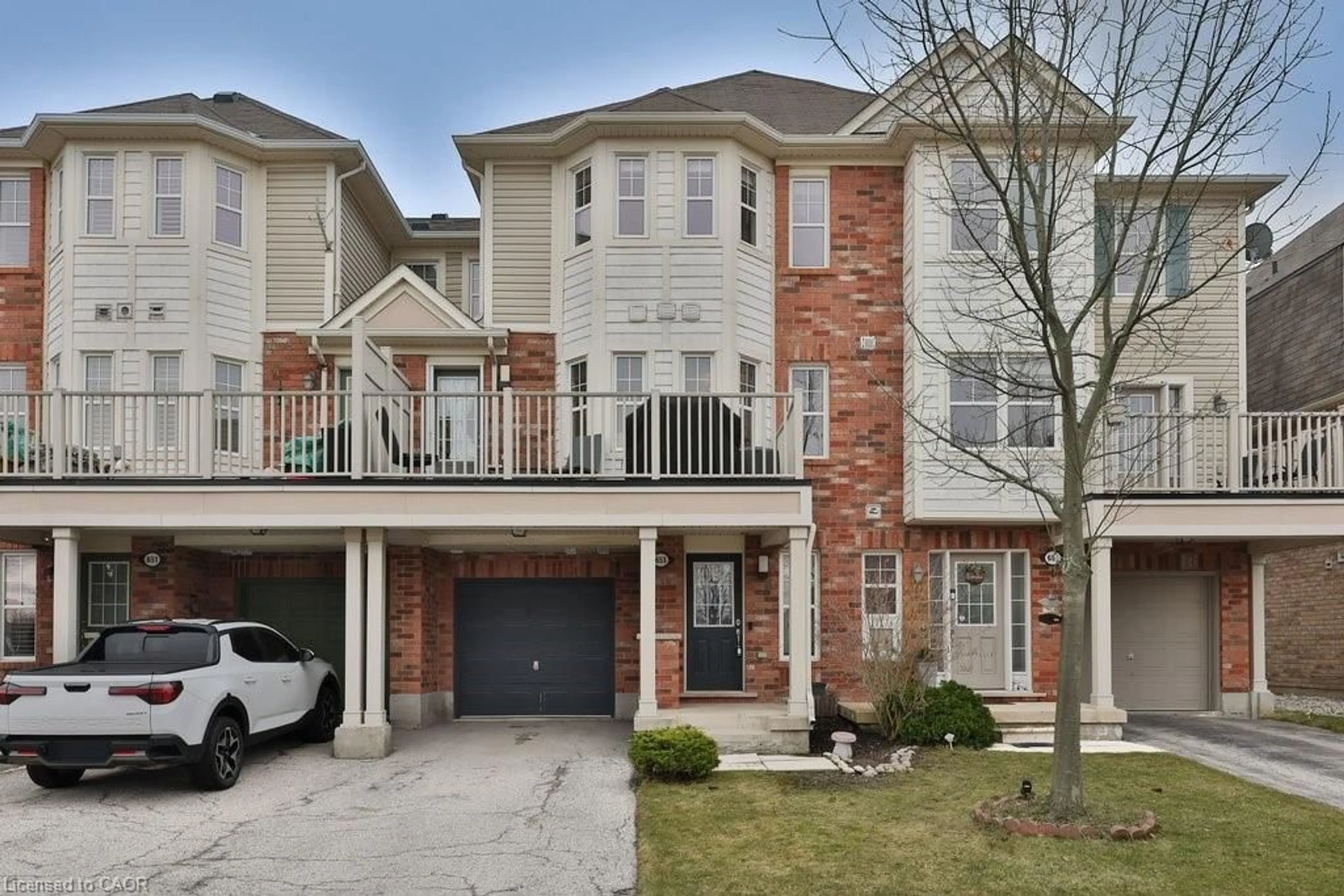 Home with brick exterior material, street for 653 Speyer Cir, Milton Ontario L9T 0Y5