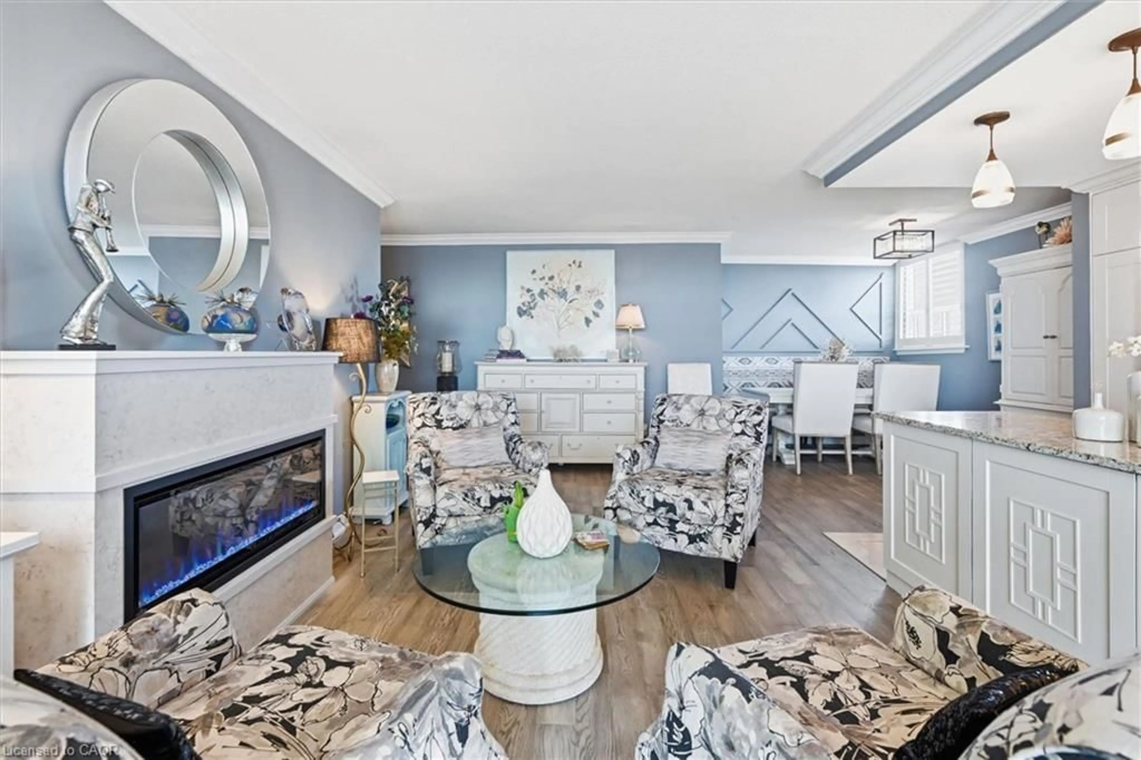 Living room with furniture, unknown for 1425 Ghent Ave #703, Burlington Ontario L7S 1X5