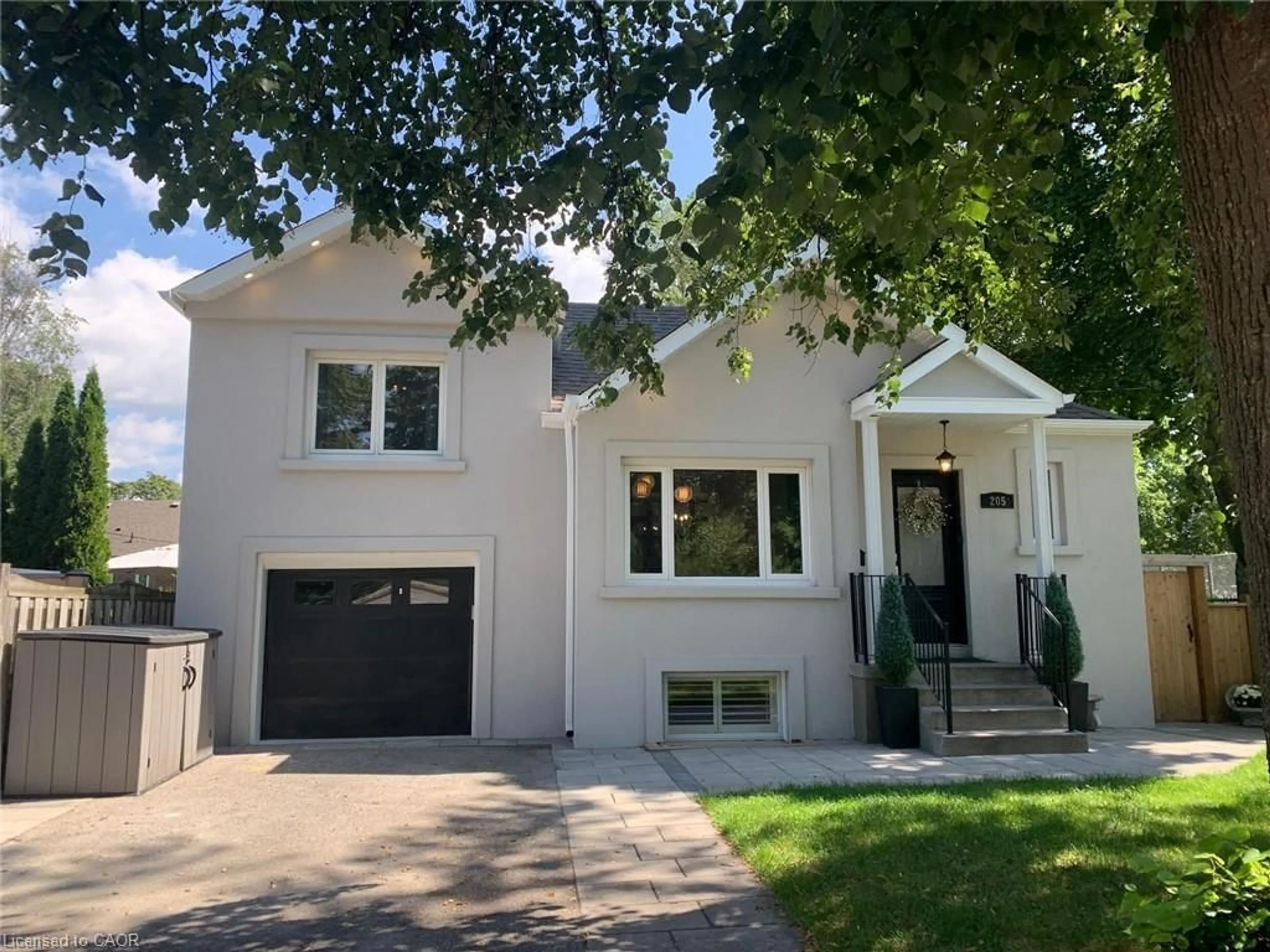 Home with vinyl exterior material, street for 205 Prince Edward Dr, Toronto Ontario M8Y 3X1