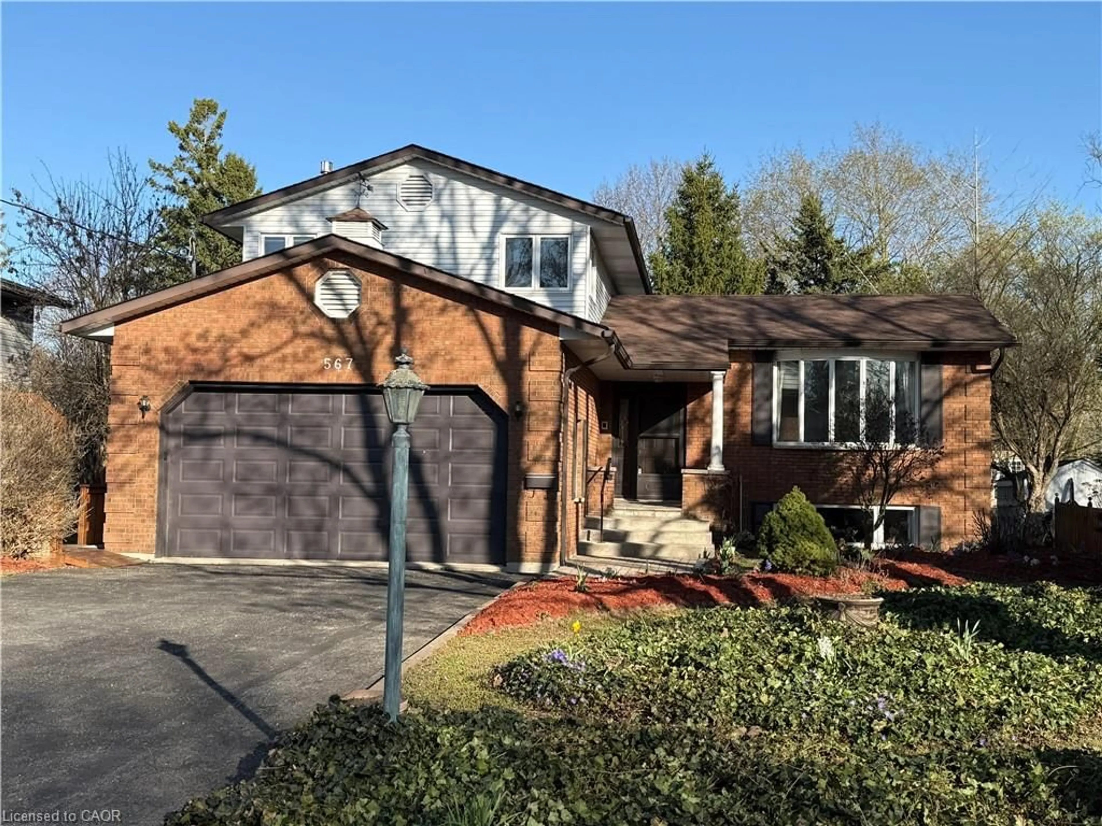 Home with brick exterior material, street for 567 Rustic Dr, Waterloo Ontario N2K 2A4
