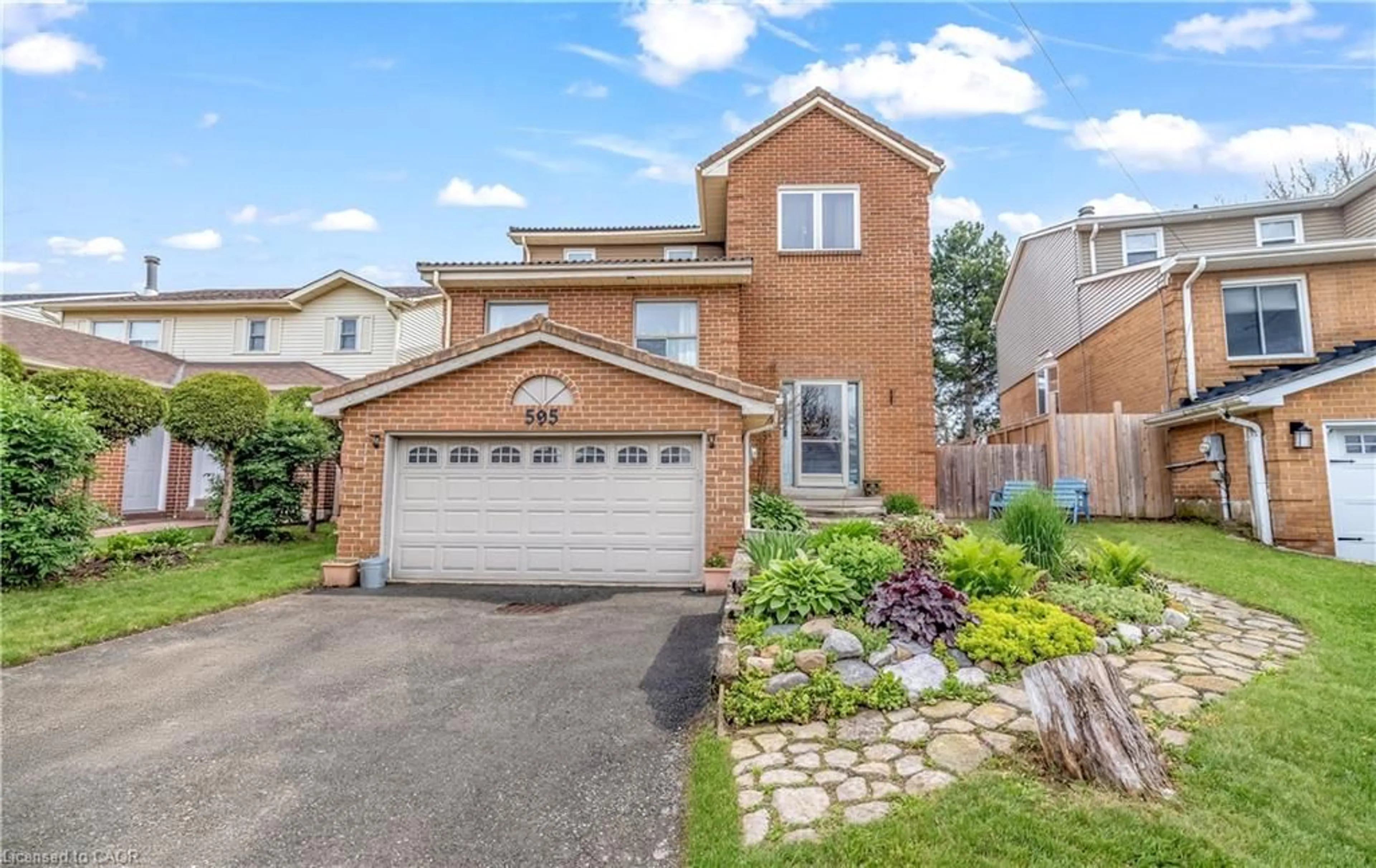 Home with brick exterior material, street for 595 Clover Park Cres, Milton Ontario L9T 4T7