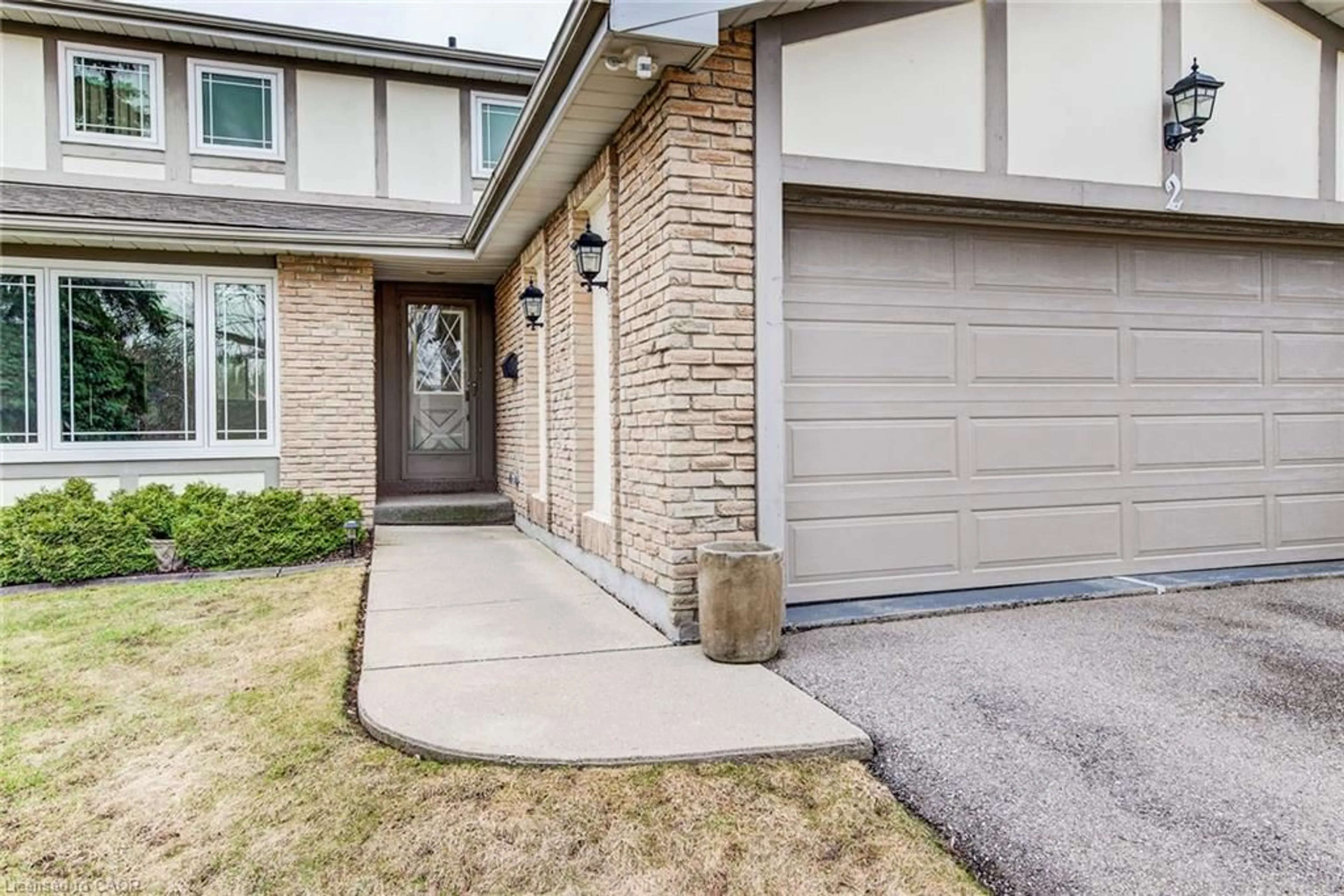 Home with brick exterior material, street for 2 Blue Spruce Crt, Kitchener Ontario N2N 1L1
