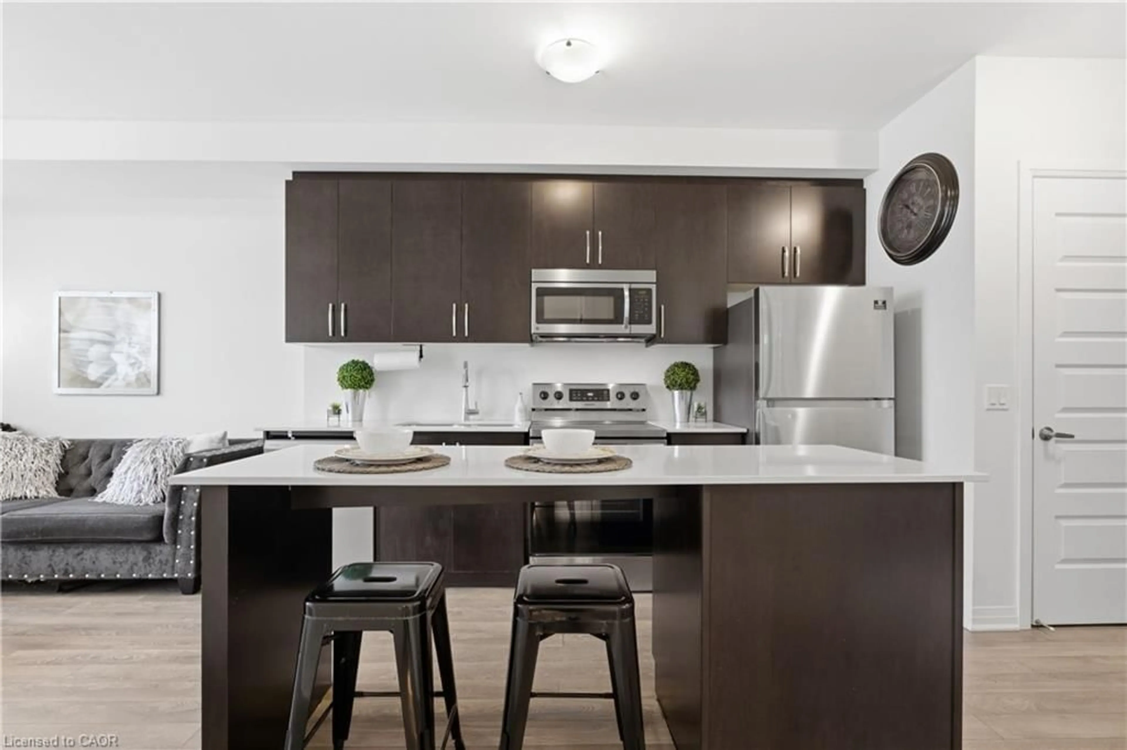 Open concept kitchen, unknown for 1105 Leger Way #106, Milton Ontario L9E 1K7