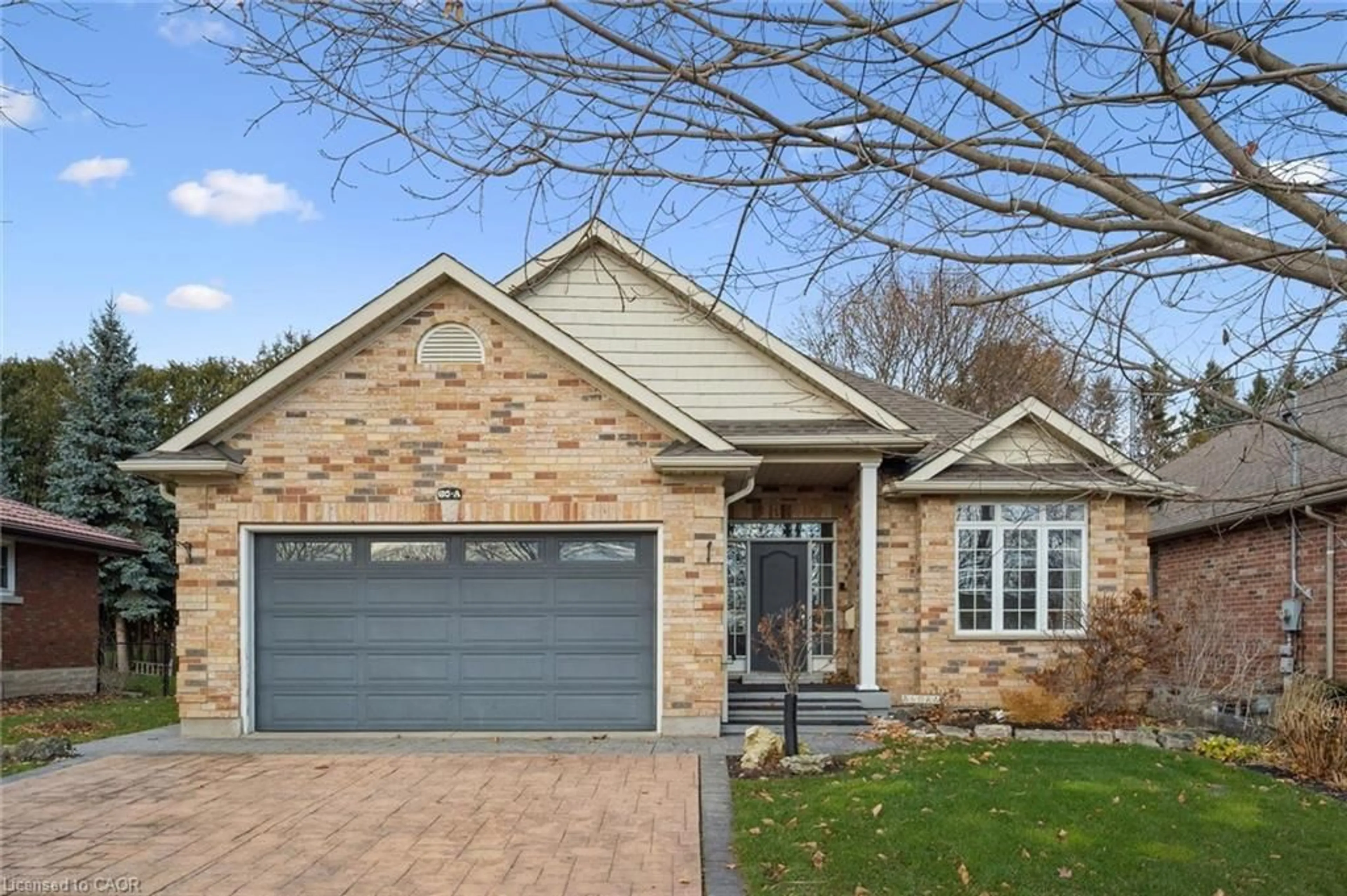 Home with brick exterior material, street for 60A Eastview Rd, Guelph Ontario N1E 1Z6