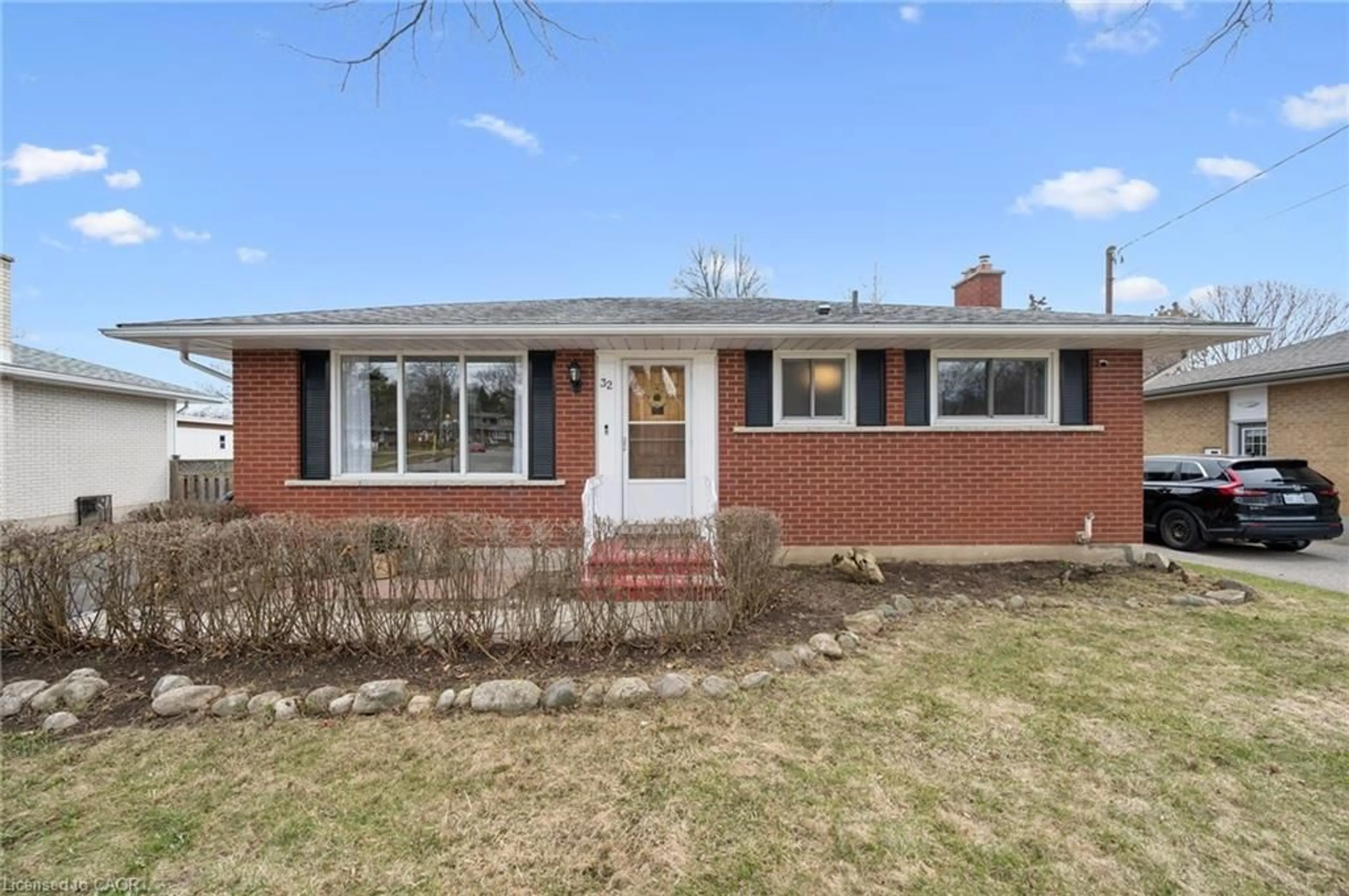 Home with brick exterior material, street for 32 Sleeman Ave, Guelph Ontario N1H 6E9