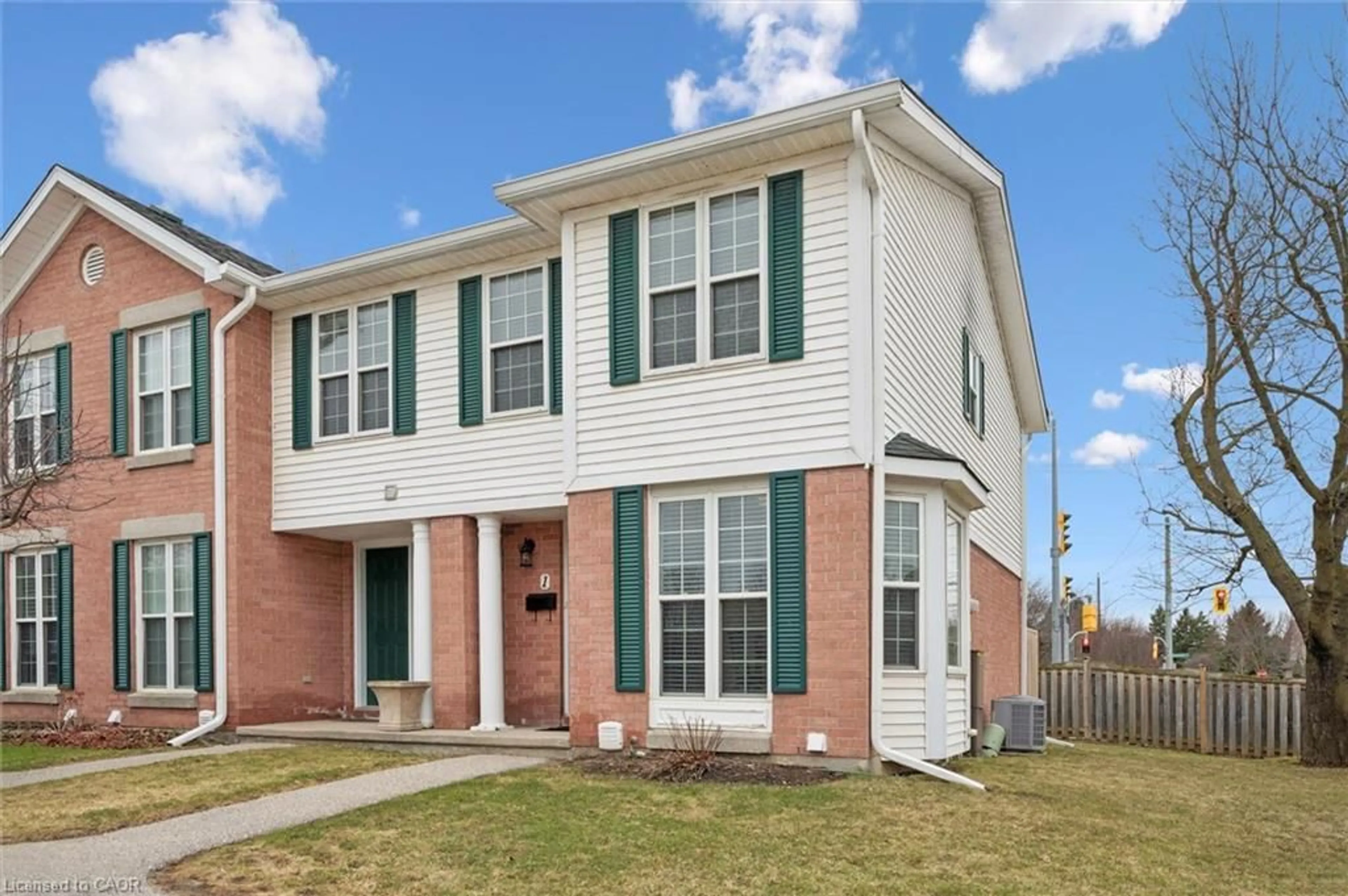 Home with brick exterior material, street for 465 Woolwich St #1, Waterloo Ontario N2K 3S4