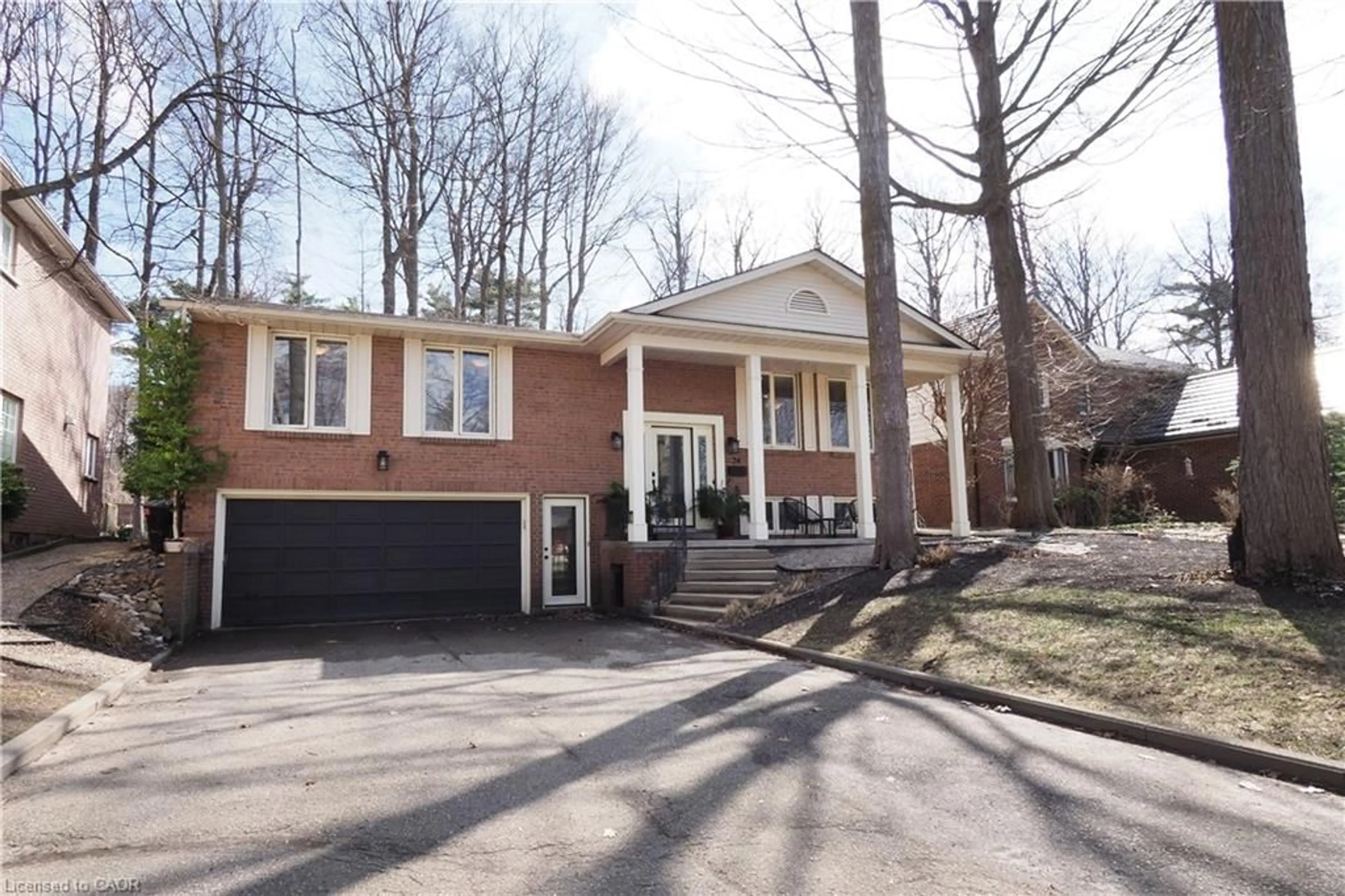 Home with brick exterior material, street for 24 Primrose Path, Kitchener Ontario N2E 2R2