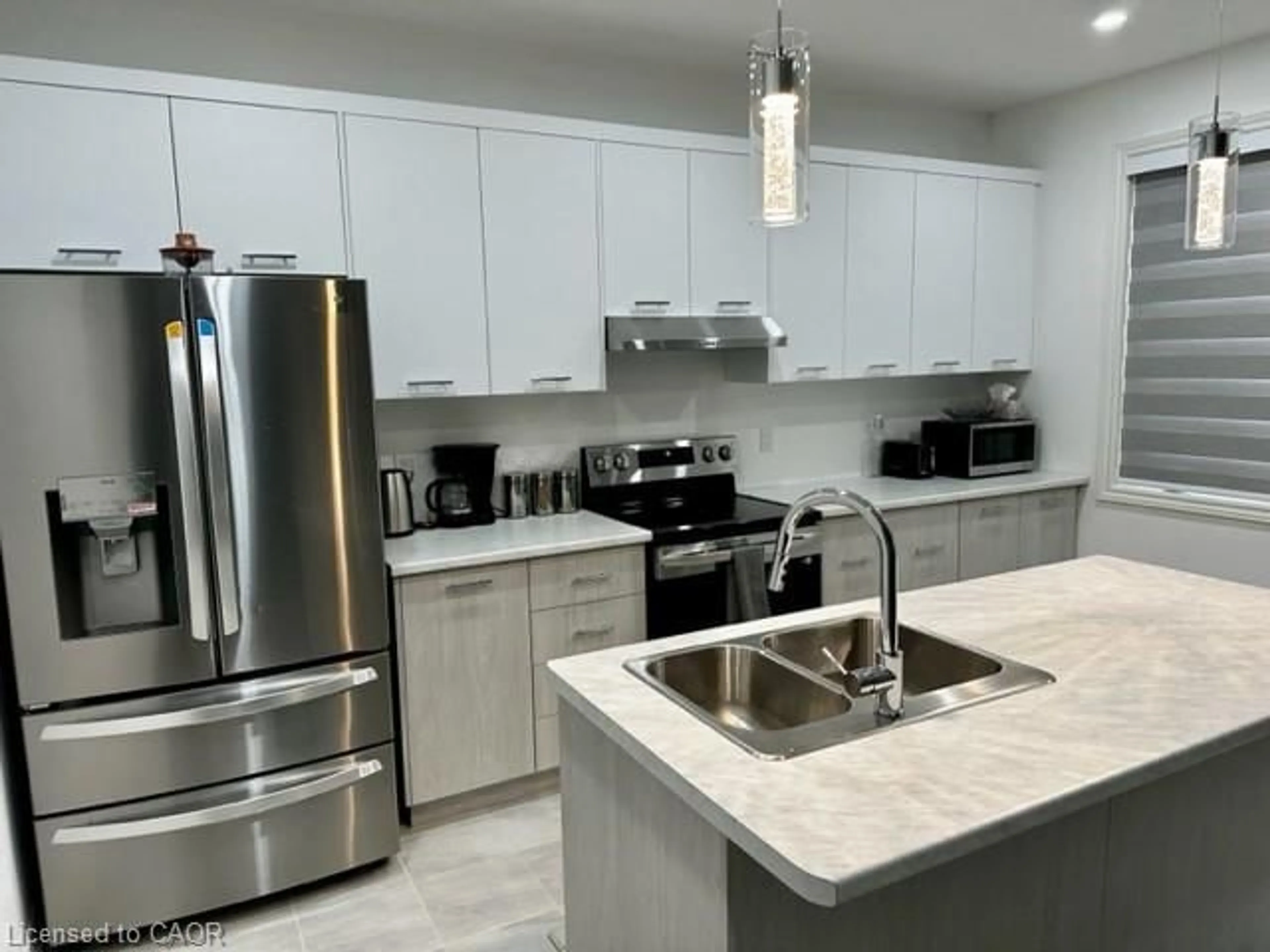 Open concept kitchen, ceramic/tile floor for 135 Rosie St, The Blue Mountains Ontario N0H 1J0