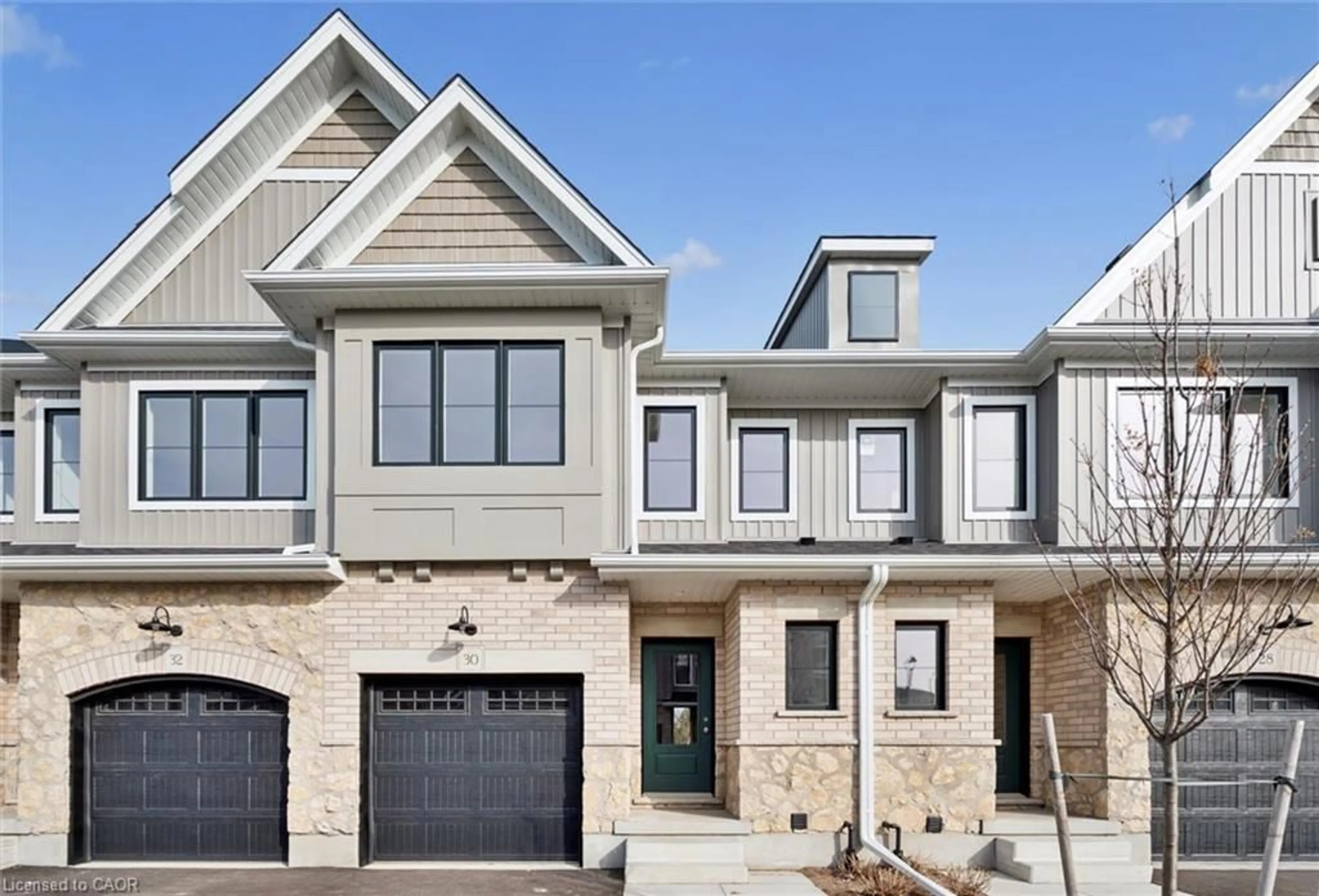 Home with brick exterior material, street for 30 Fieldstone Lane, Elora Ontario N0B 1S0