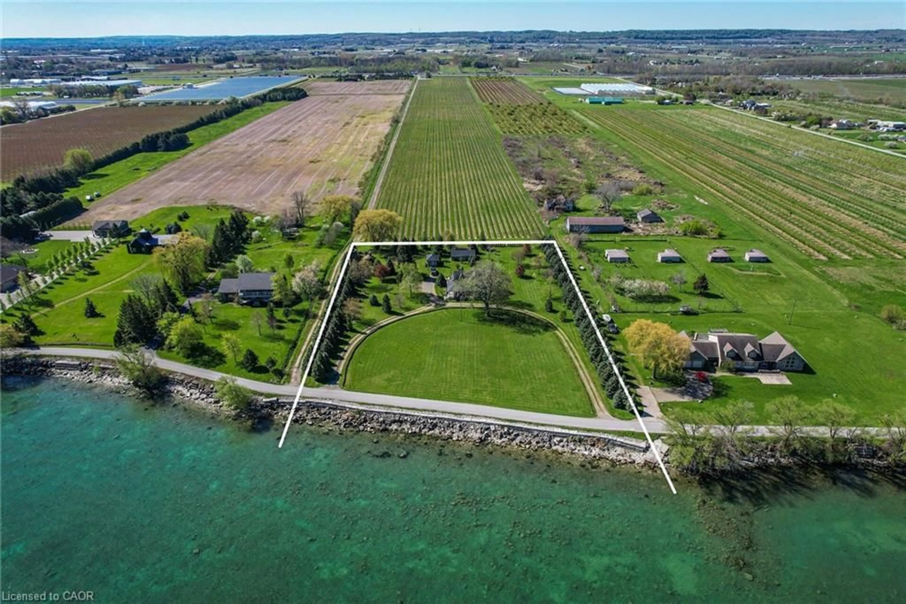 A pic from outside/outdoor area/front of a property/back of a property/a pic from drone, water/lake/river/ocean view for 3718 Lakeshore Rd, Beamsville Ontario L3J 0X2
