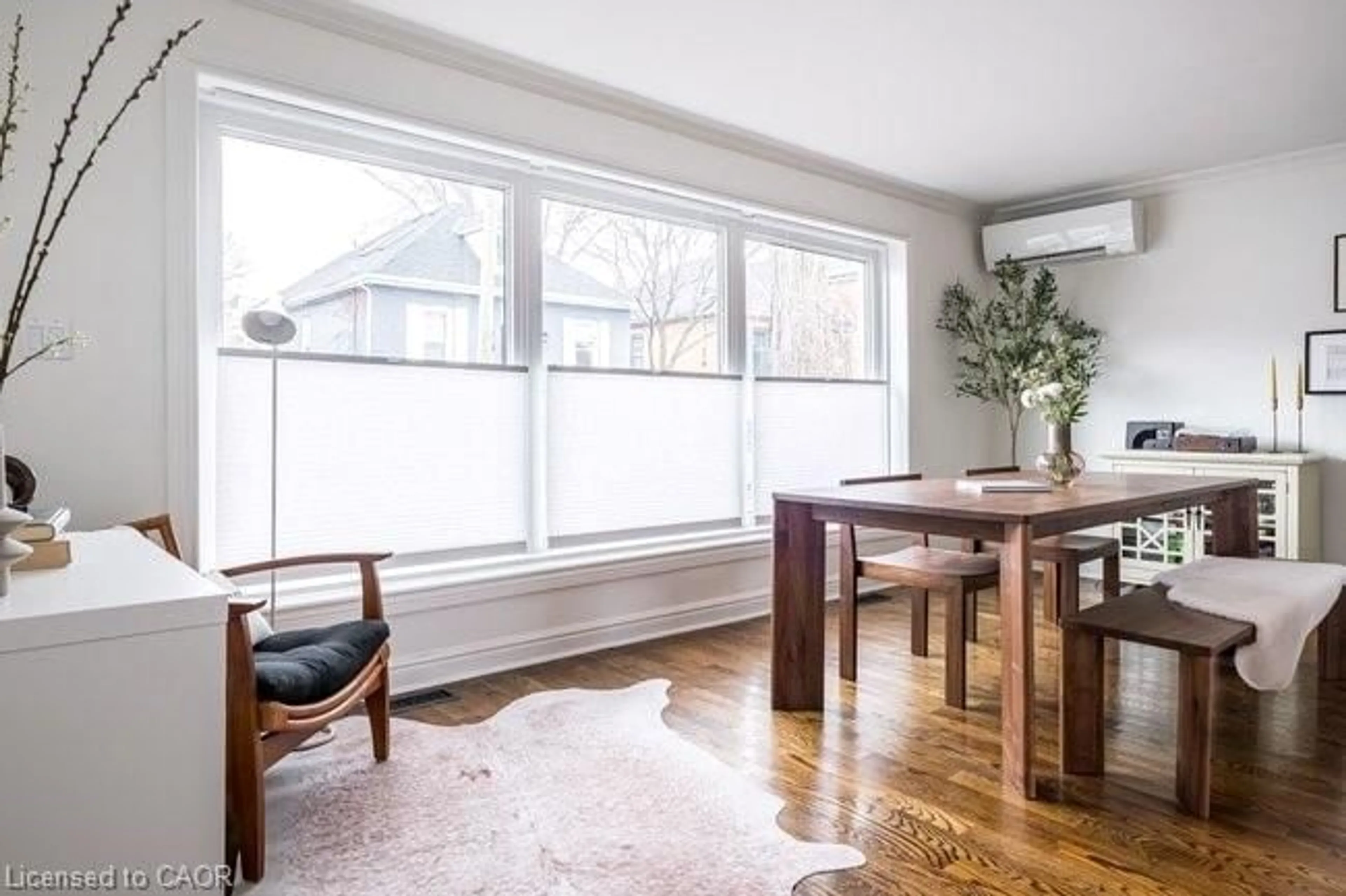 Dining room, wood/laminate floor for 14 Reginald St, Hamilton Ontario L8P 3X9
