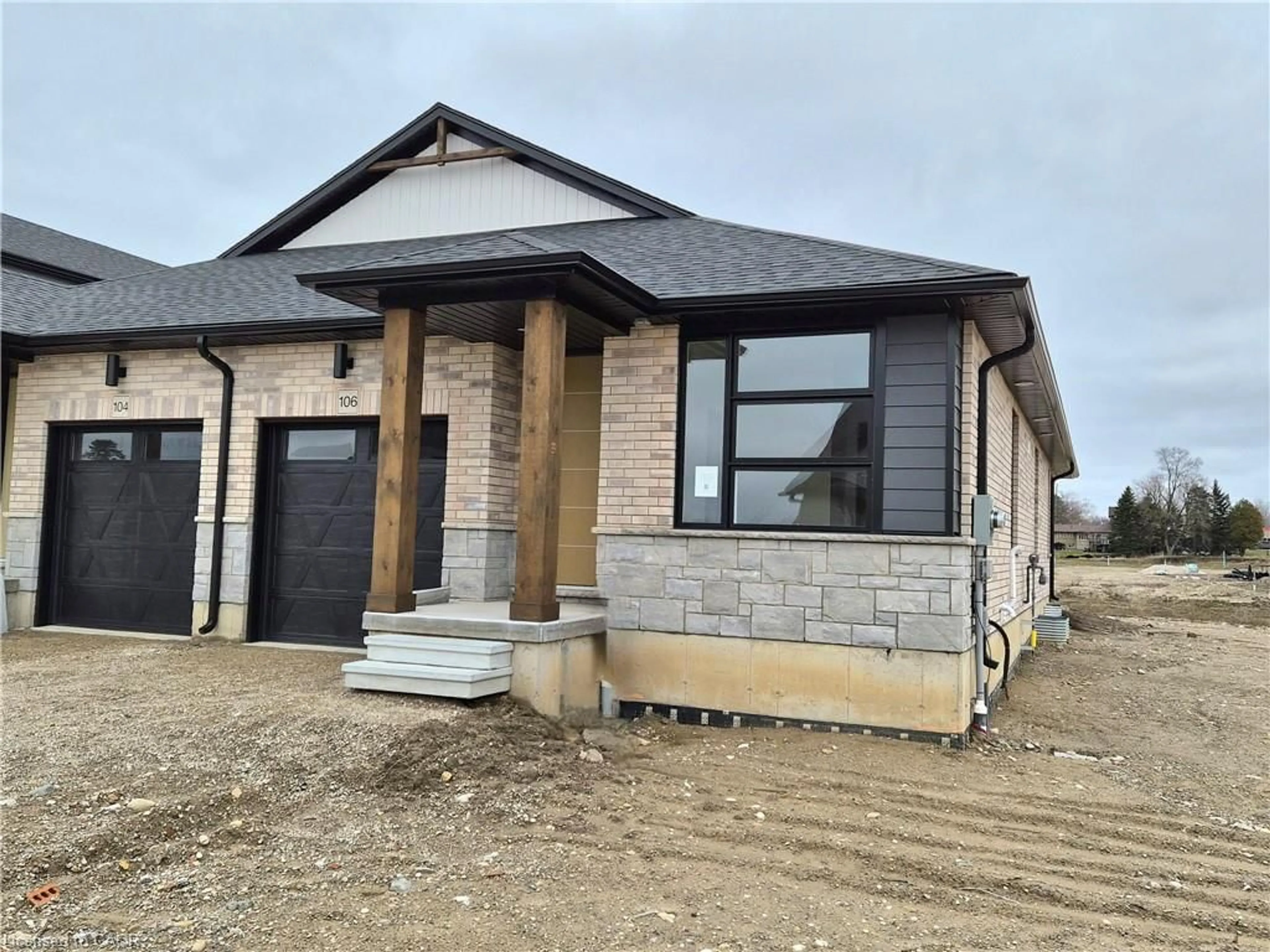 Home with brick exterior material, building for 106 Thackeray Way, Harriston Ontario N0G 1Z0