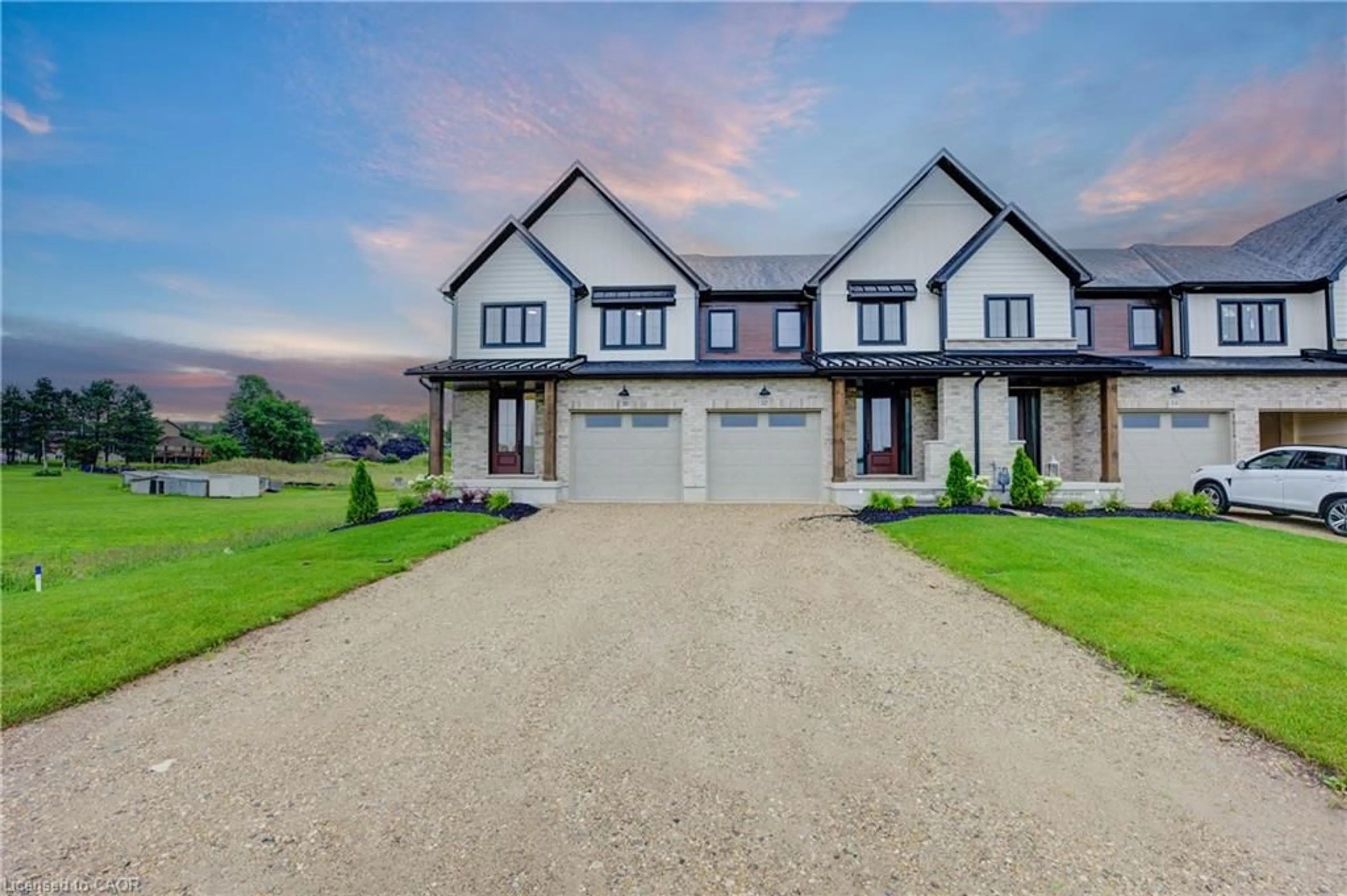 A pic from outside/outdoor area/front of a property/back of a property/a pic from drone, street for 30 Anne St, Harriston Ontario N0G 1Z0