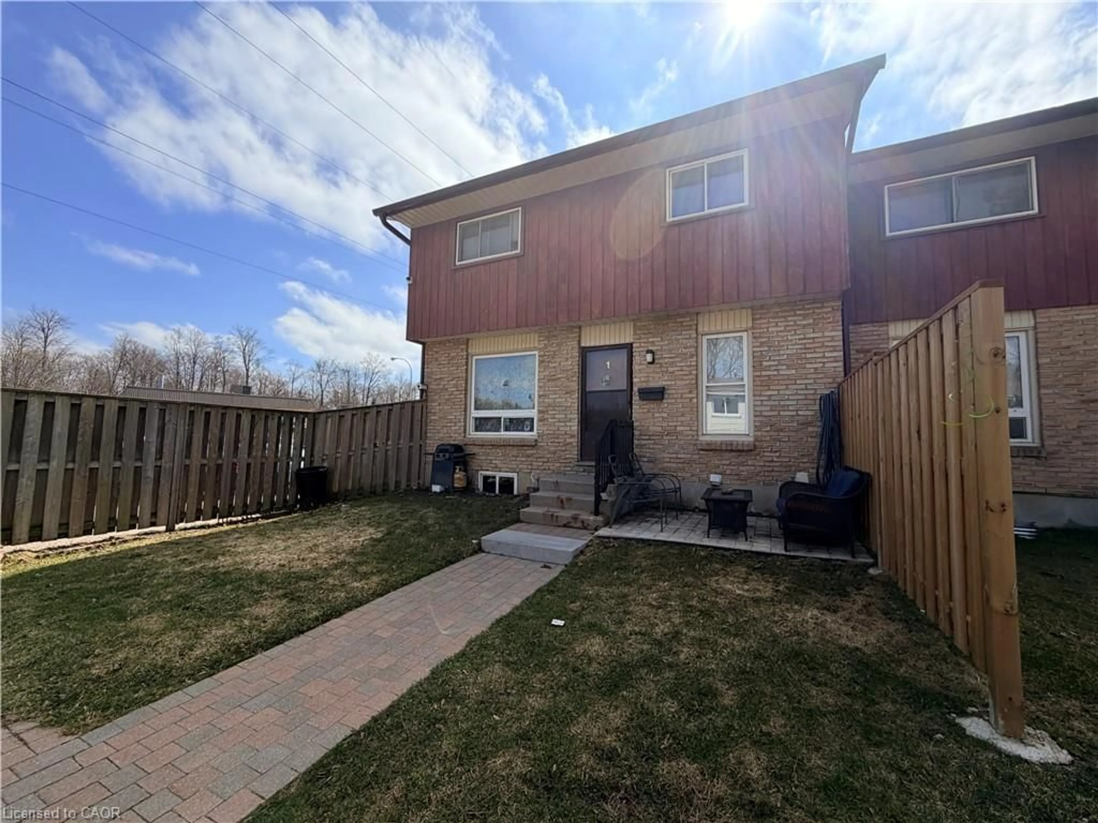 A pic from outside/outdoor area/front of a property/back of a property/a pic from drone, street for 249 Cedarbrae Ave #1, Waterloo Ontario N2L 4S8