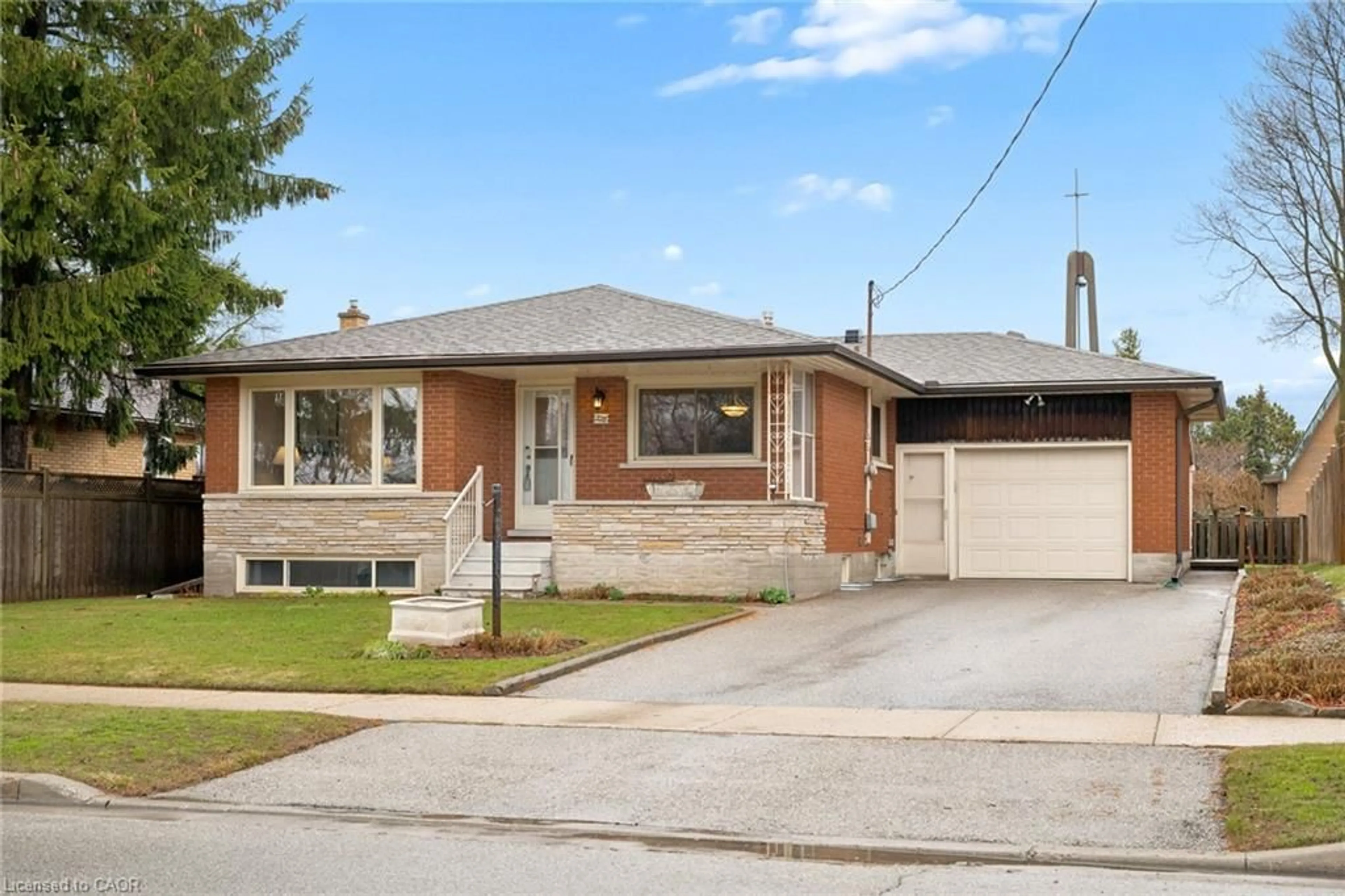 Home with brick exterior material, street for 228 Kenneth Ave, Kitchener Ontario N2A 1W4