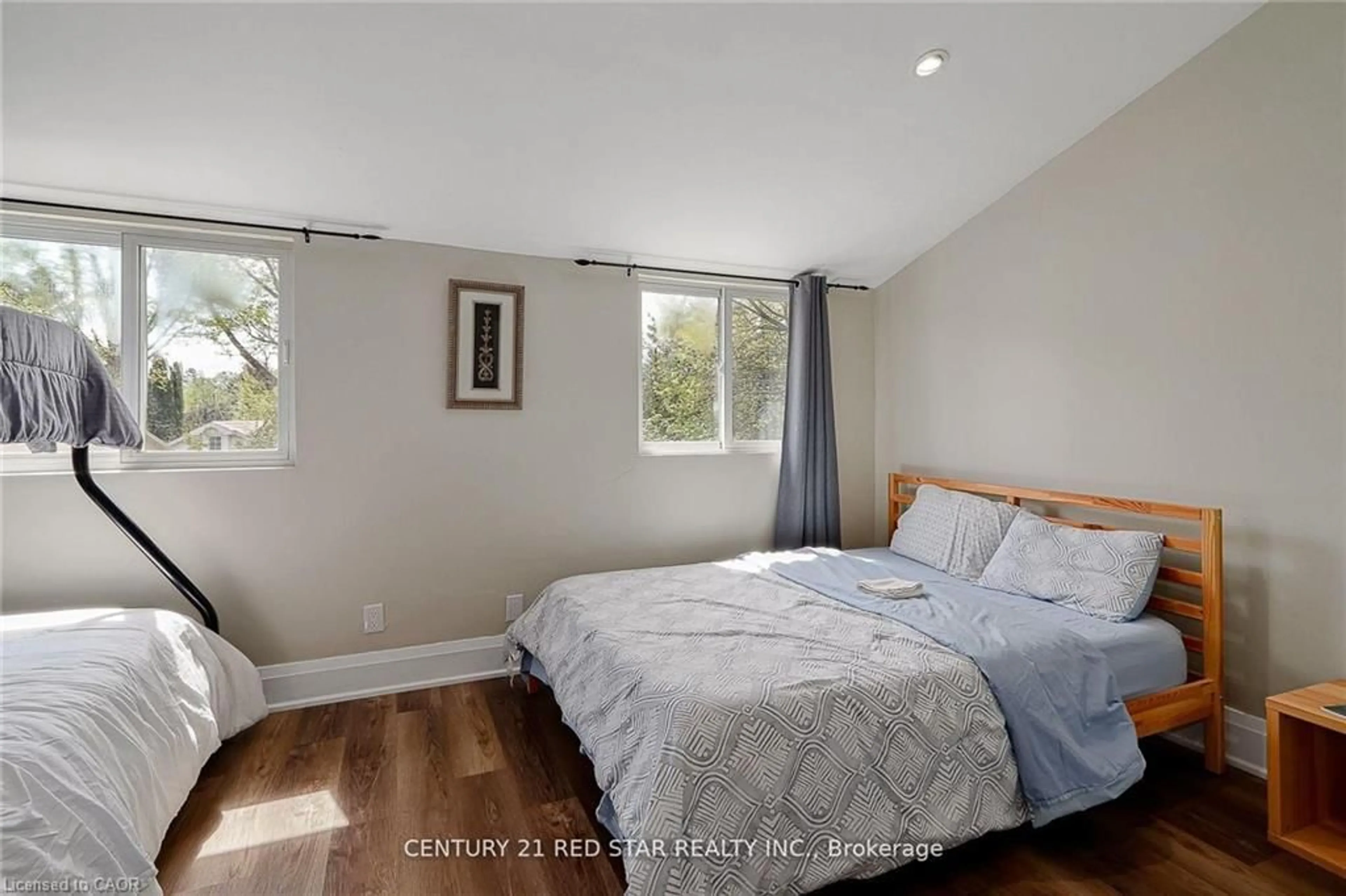 Bedroom with bed, wood/laminate floor for 112 Nordic Rd, Ravenna Ontario N0H 2E0