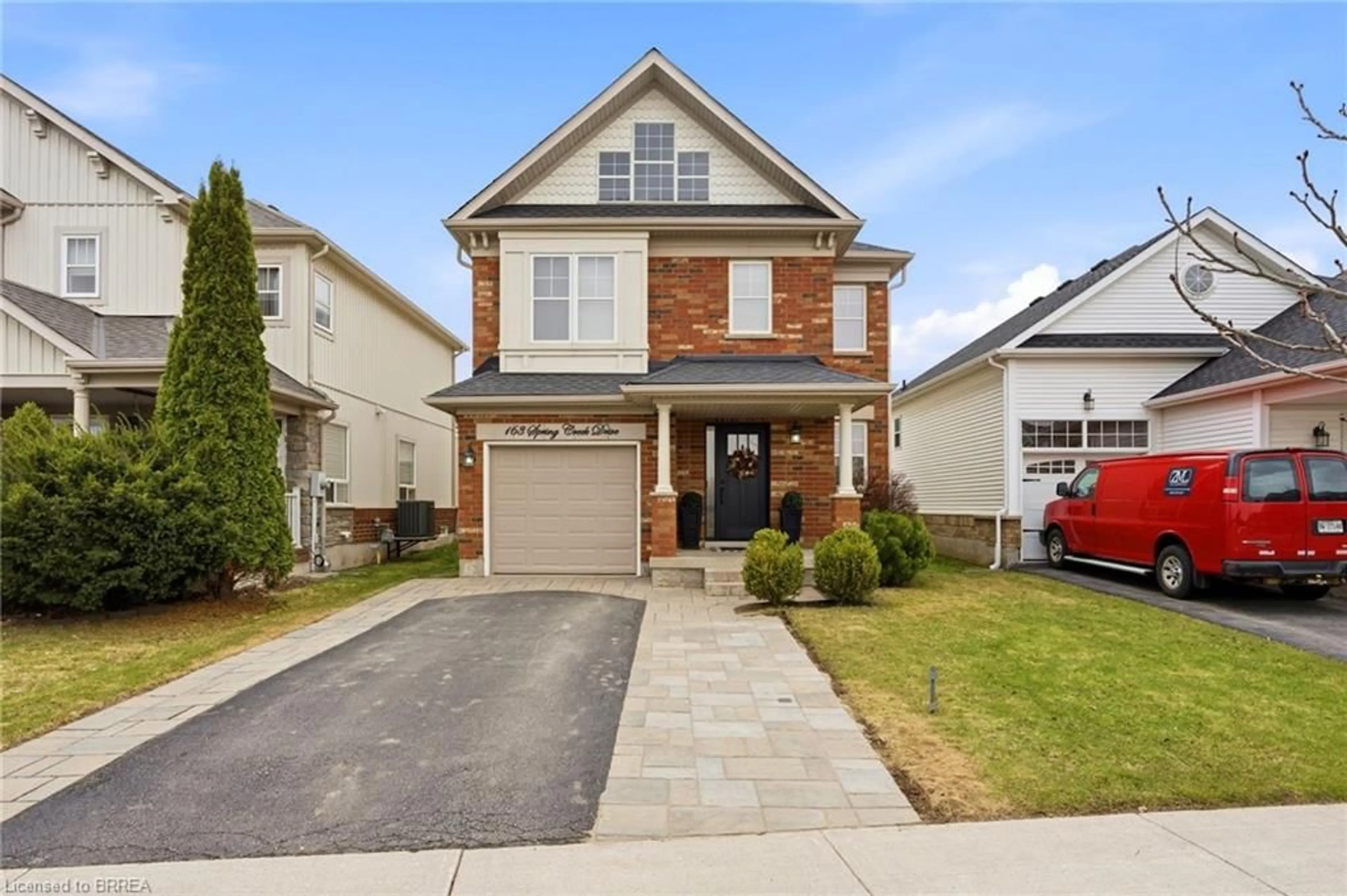 Home with brick exterior material, street for 163 Spring Creek Dr, Waterdown Ontario L8B 0X8