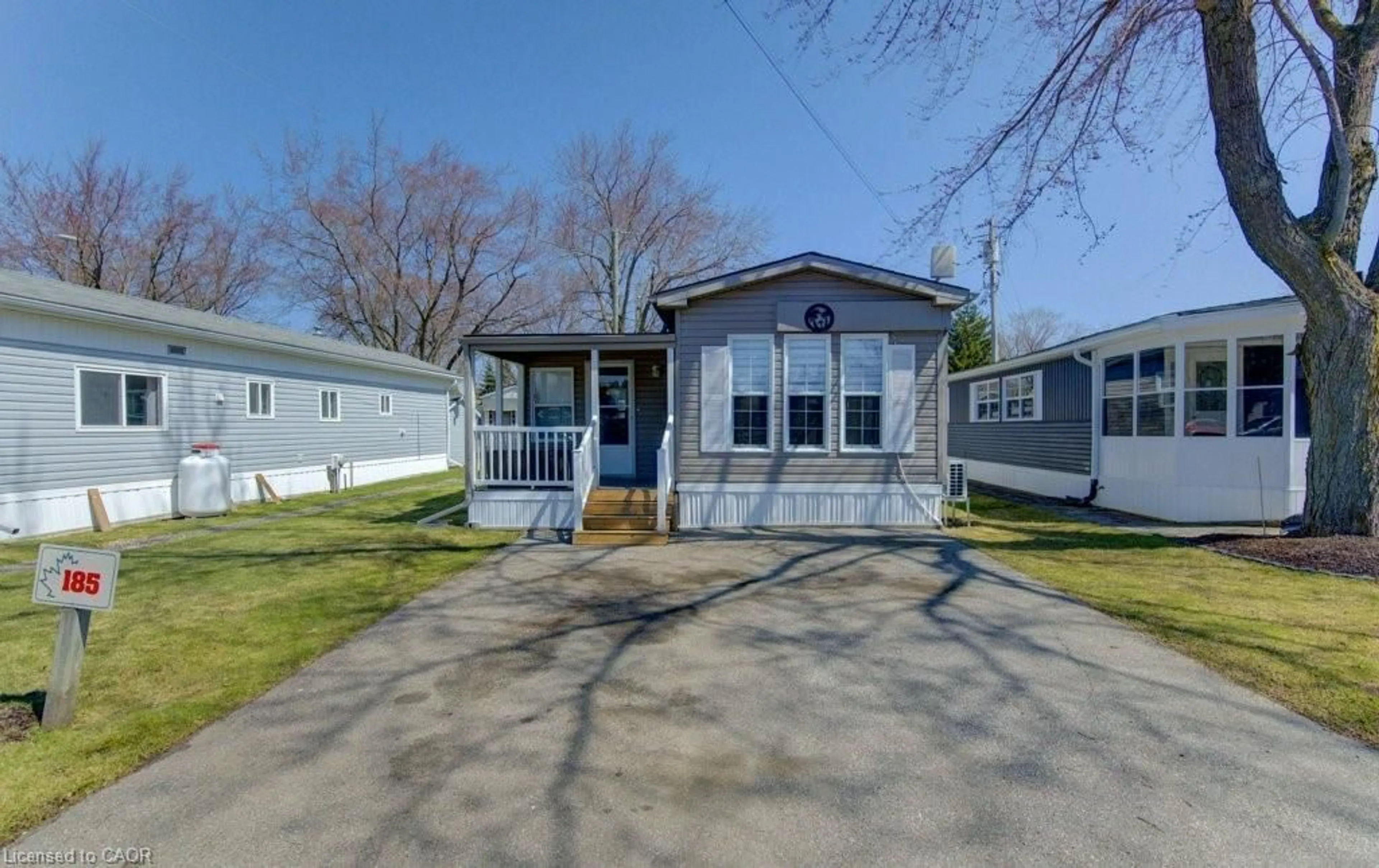 Home with vinyl exterior material, street for 580 Beaver Creek Rd #185, Waterloo Ontario N2J 3Z4