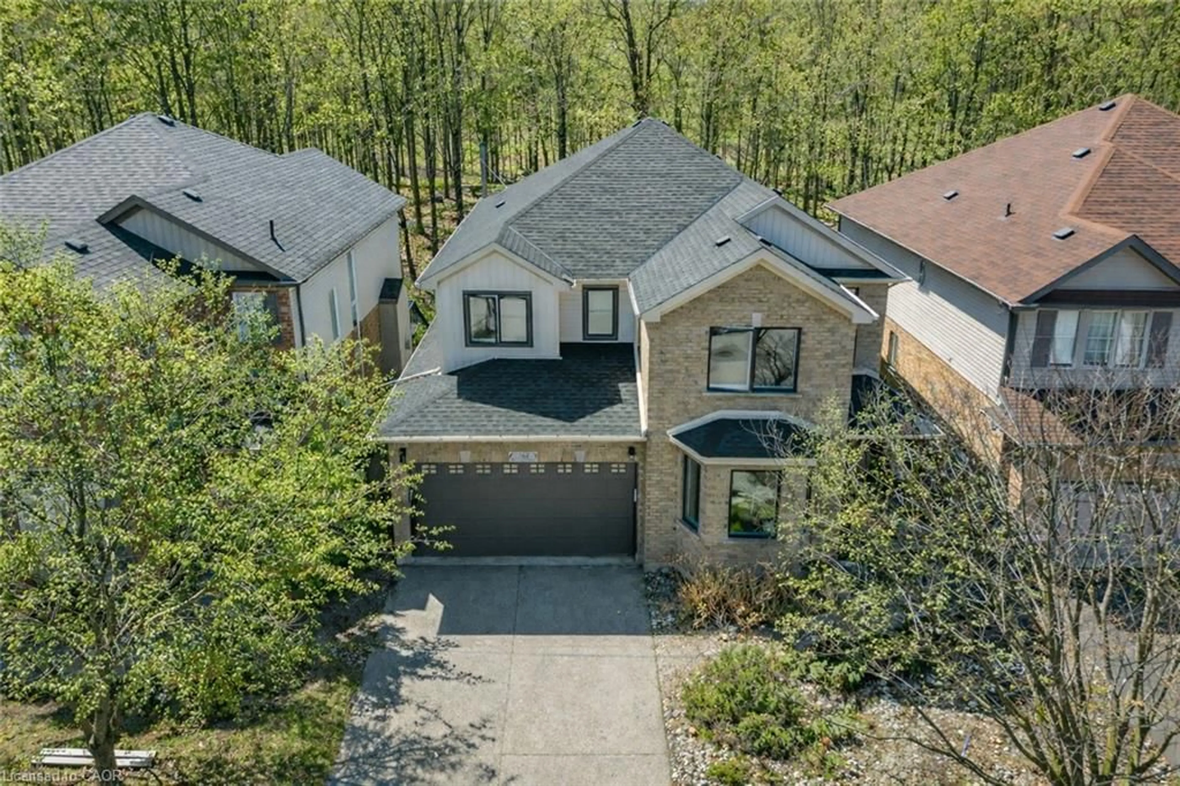 A pic from outside/outdoor area/front of a property/back of a property/a pic from drone, unknown for 361 Red Osier Rd, Waterloo Ontario N2V 2V8