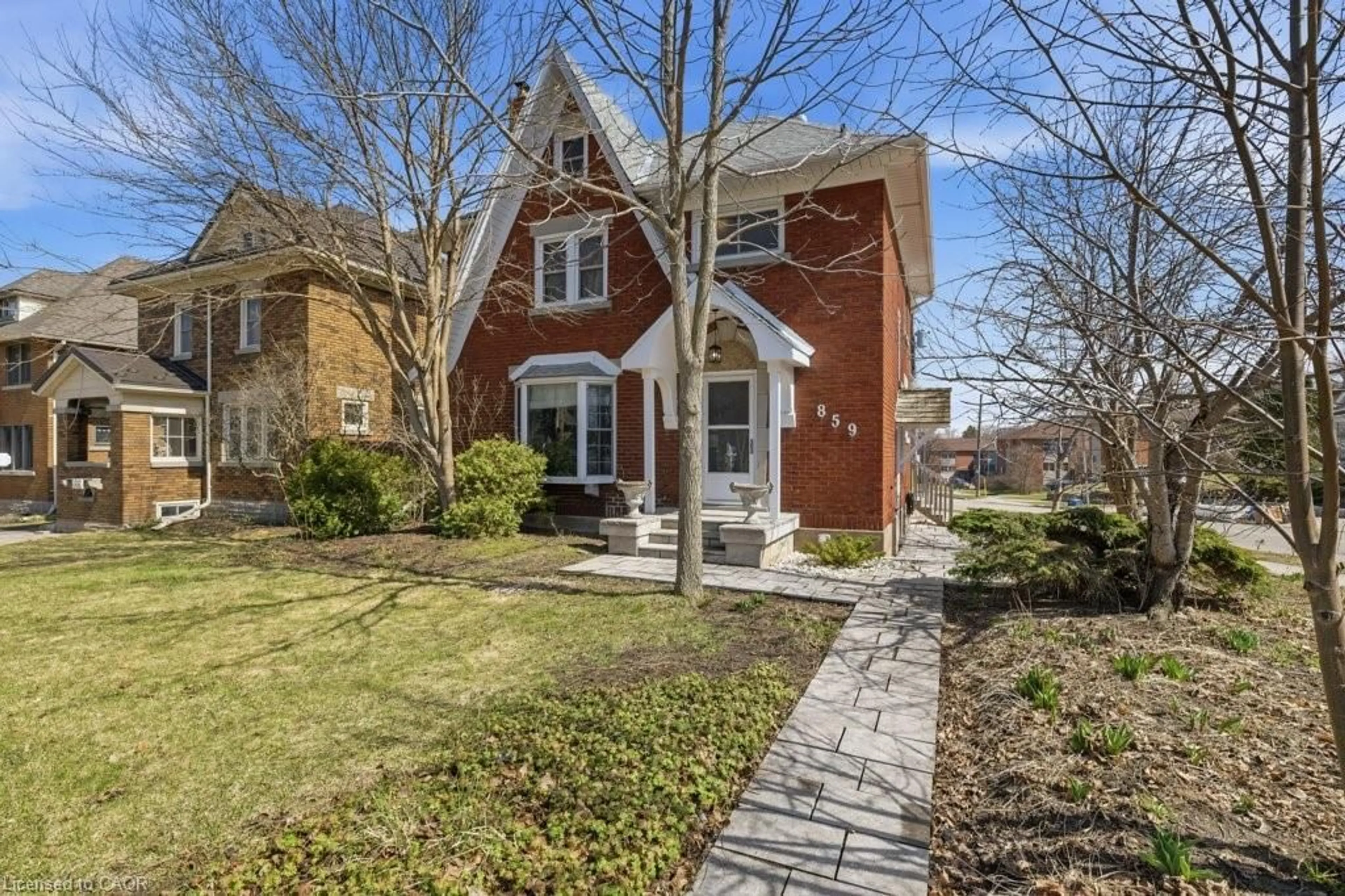 Home with brick exterior material, street for 859 Queen's Blvd, Kitchener Ontario N2M 1A6