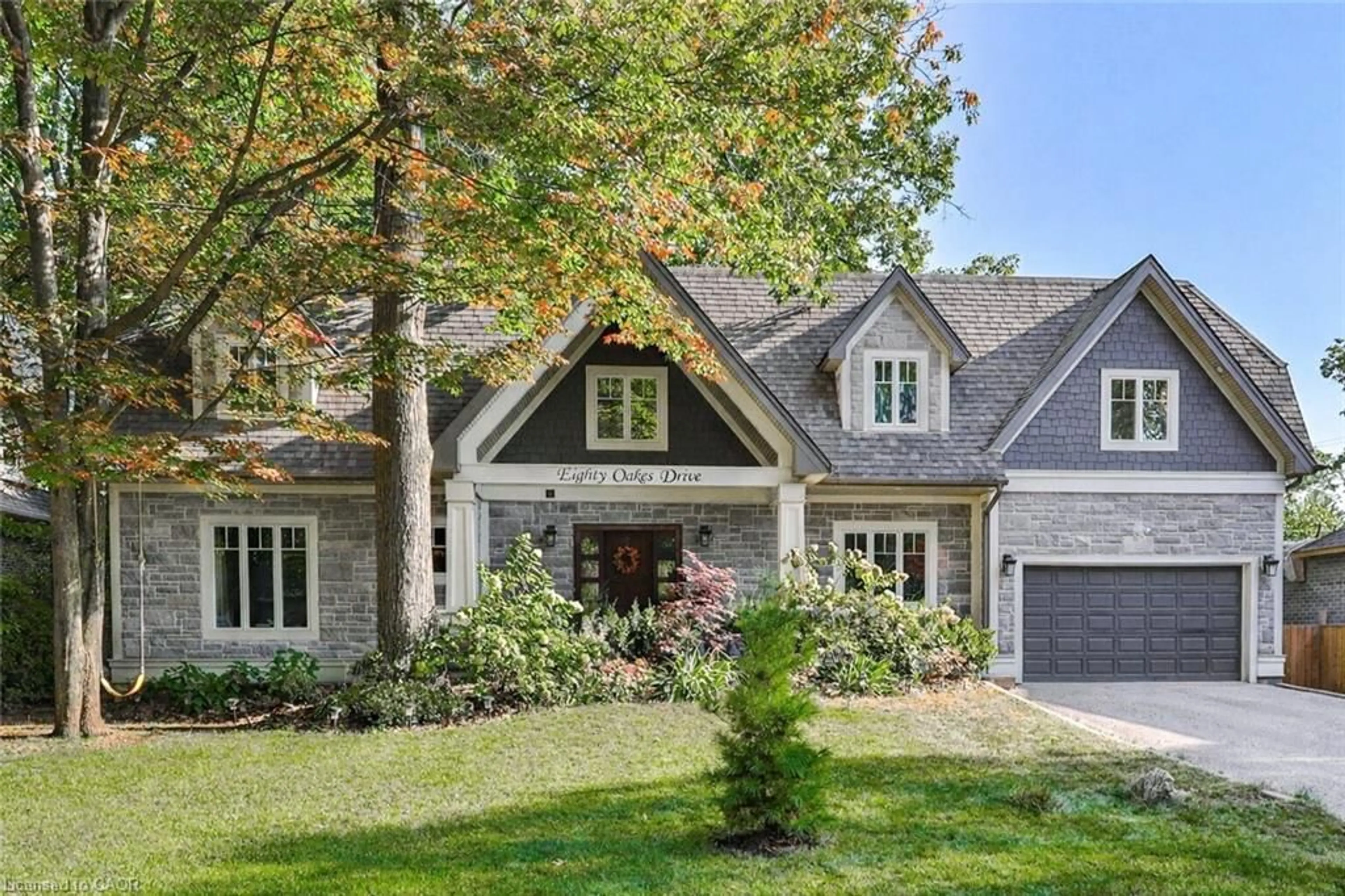 Home with brick exterior material, street for 80 Oakes Dr, Mississauga Ontario L5G 3M1