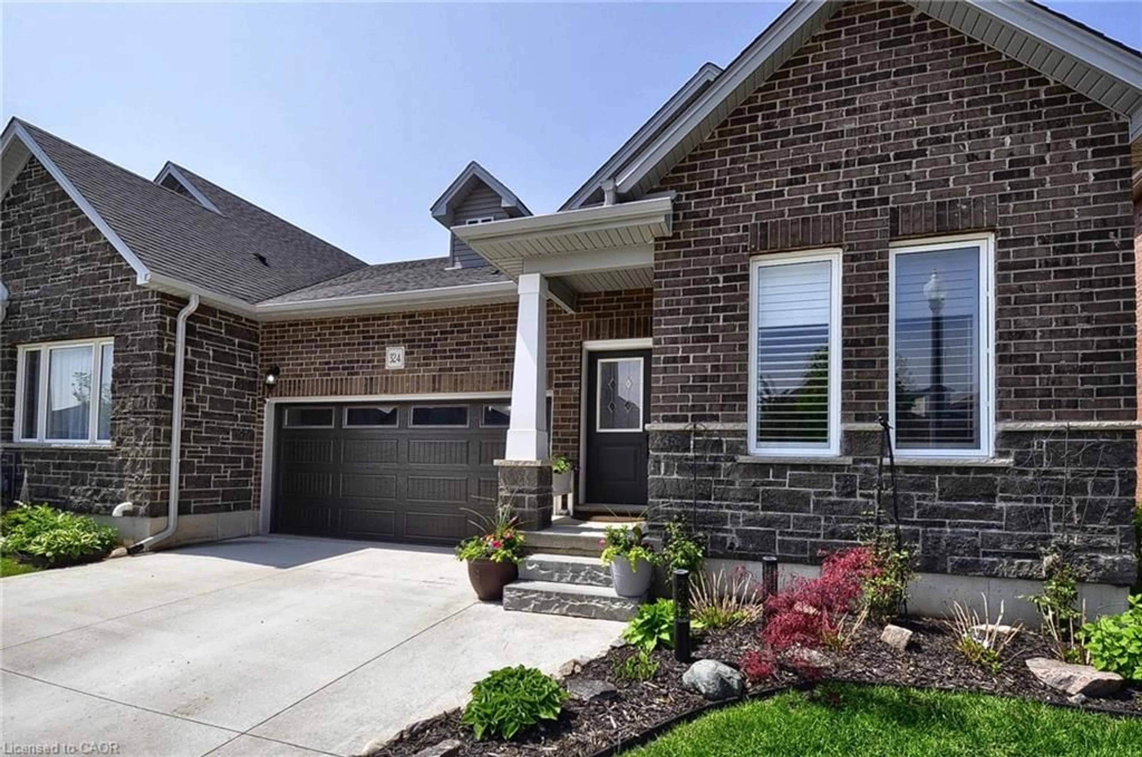 Home with brick exterior material, street for 324 Fairway Rd, Woodstock Ontario N4T 0A4