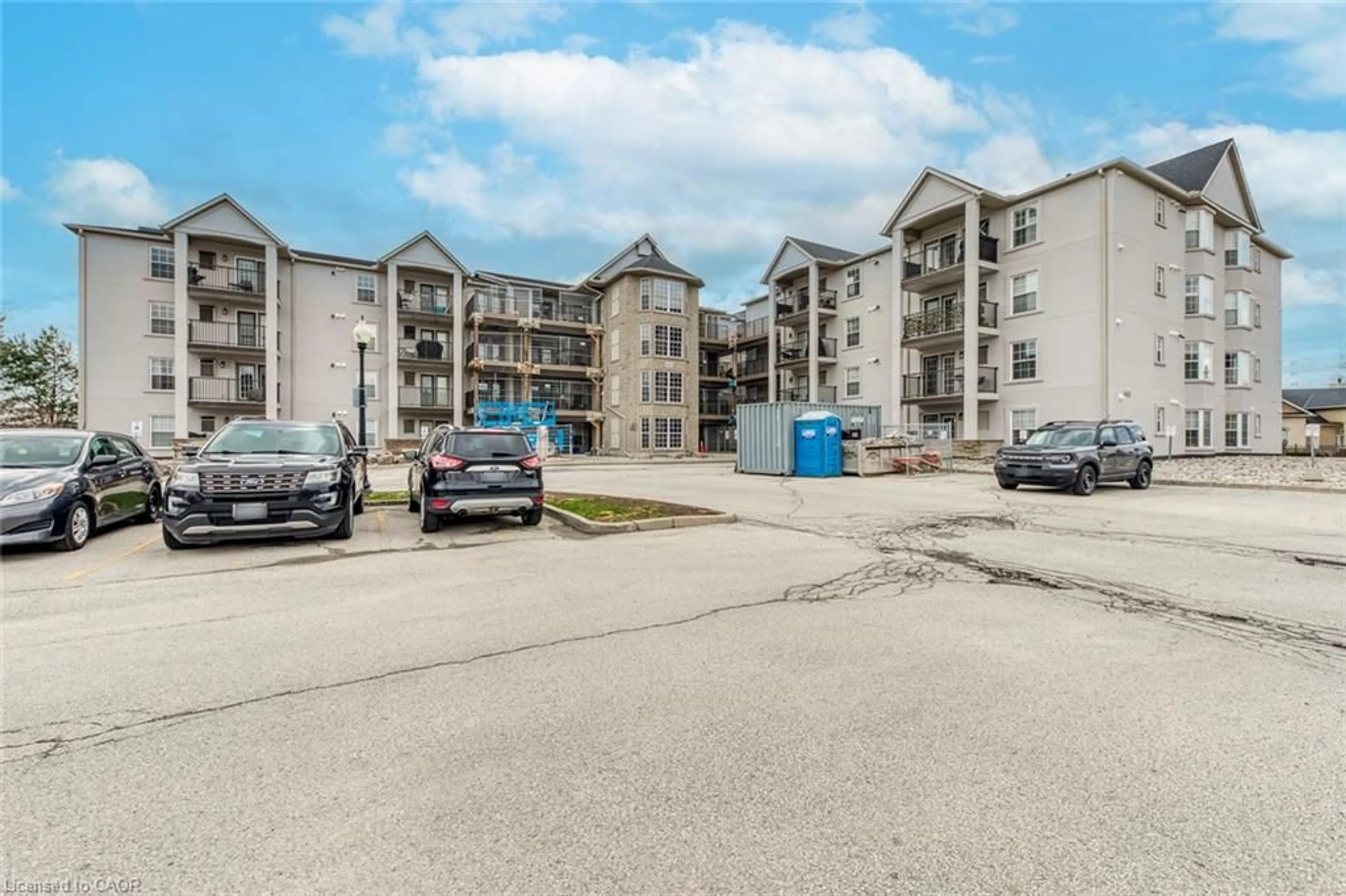 A pic from outside/outdoor area/front of a property/back of a property/a pic from drone, unknown for 1411 Walker's Line #302, Burlington Ontario L7M 4P5