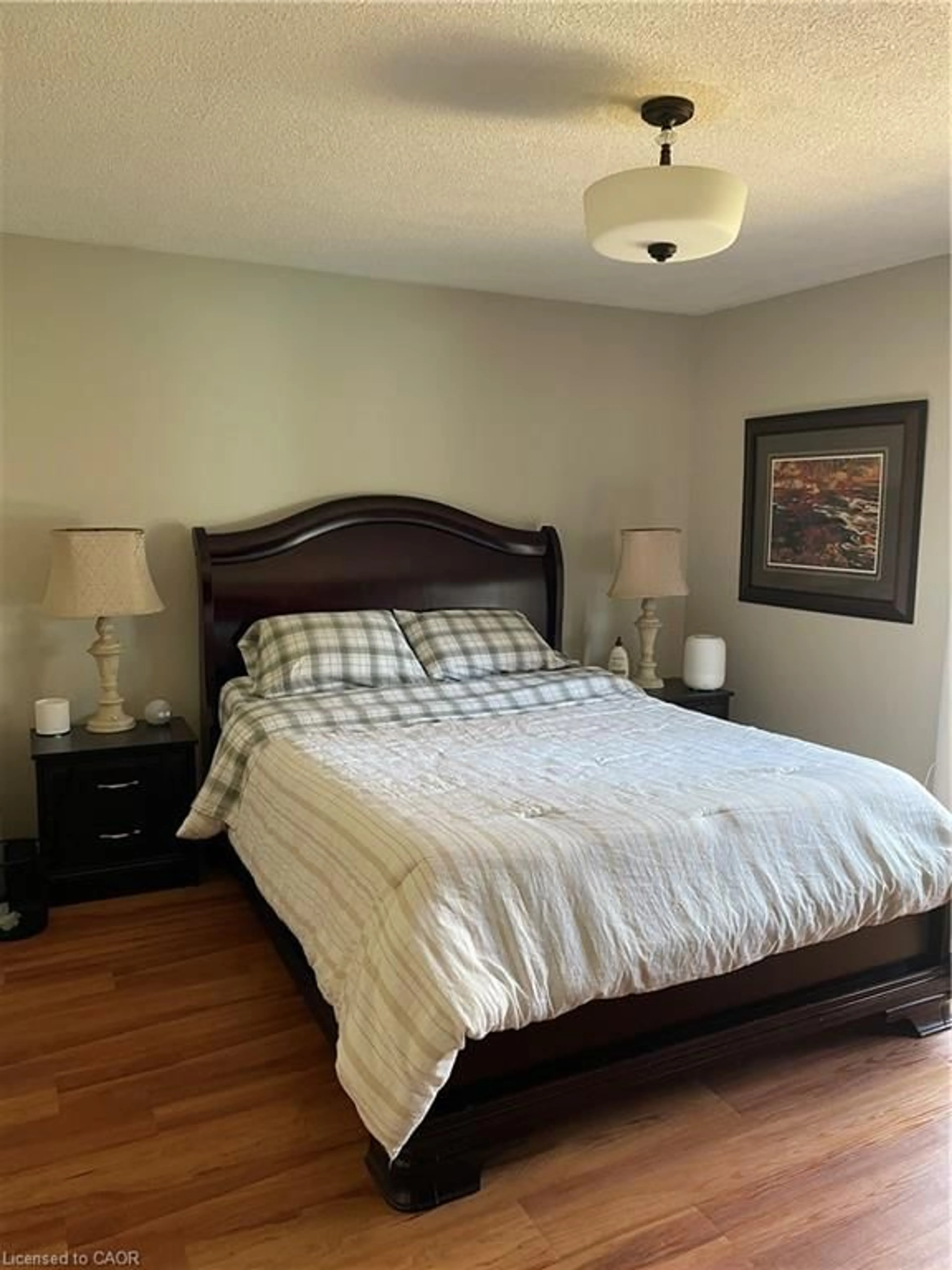 Bedroom with bed, wood/laminate floor for 22 Novoco Dr, Hamilton Ontario L9C 7E8