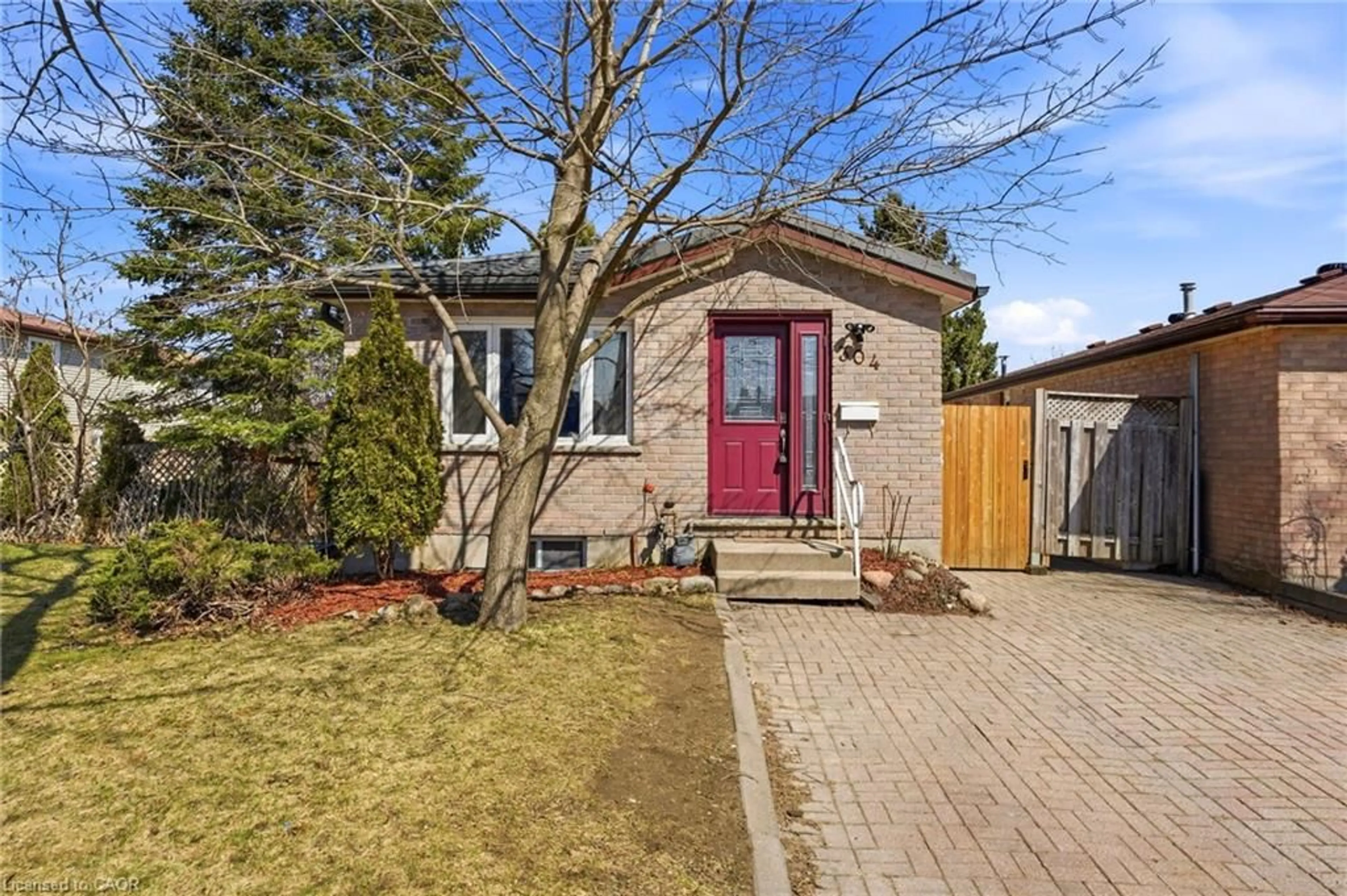 Home with brick exterior material, street for 304 Dinison Pl, Kitchener Ontario N2E 3A6