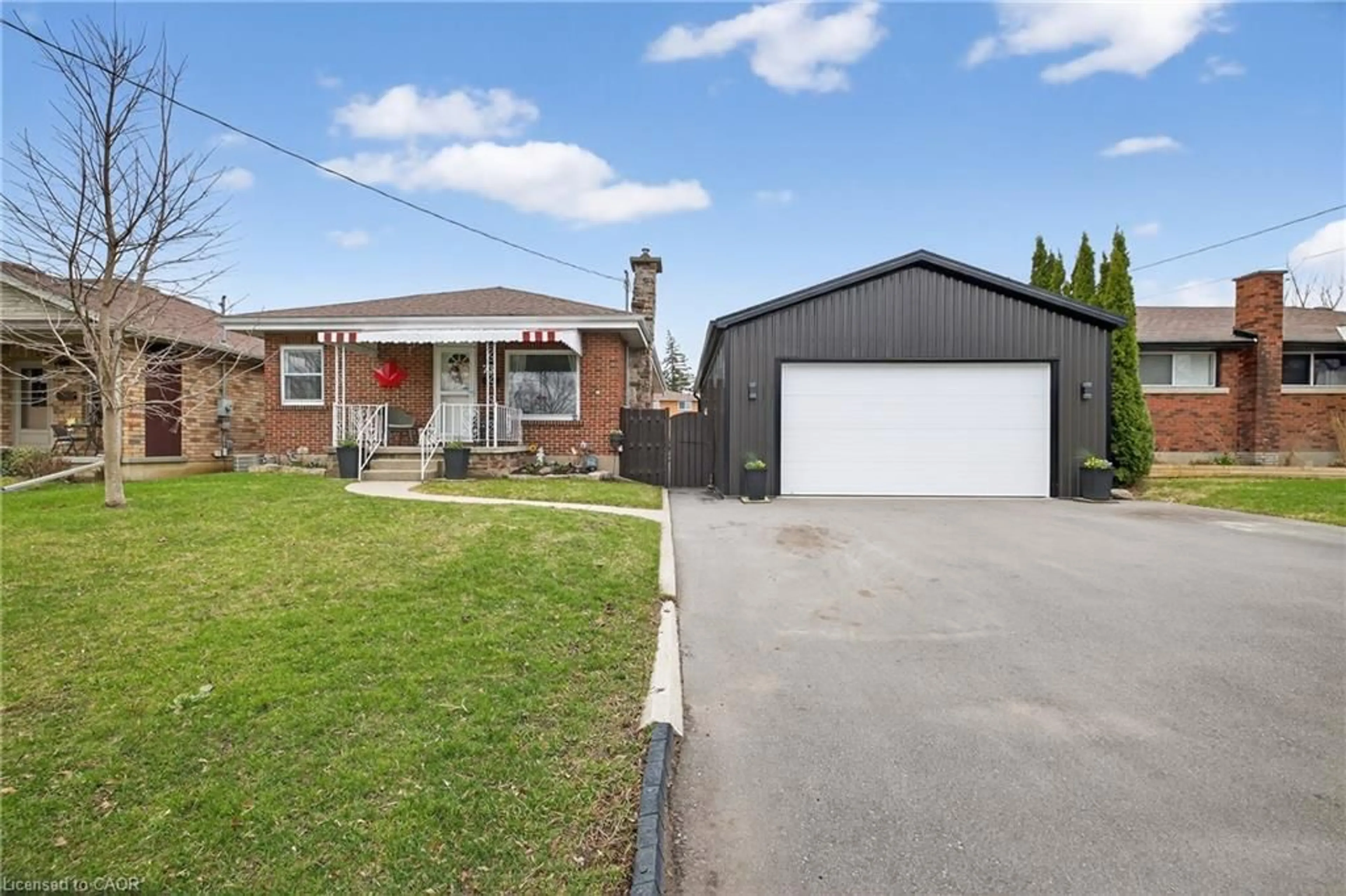 A pic from outside/outdoor area/front of a property/back of a property/a pic from drone, street for 73 Avondale St, Brantford Ontario N3S 4M1