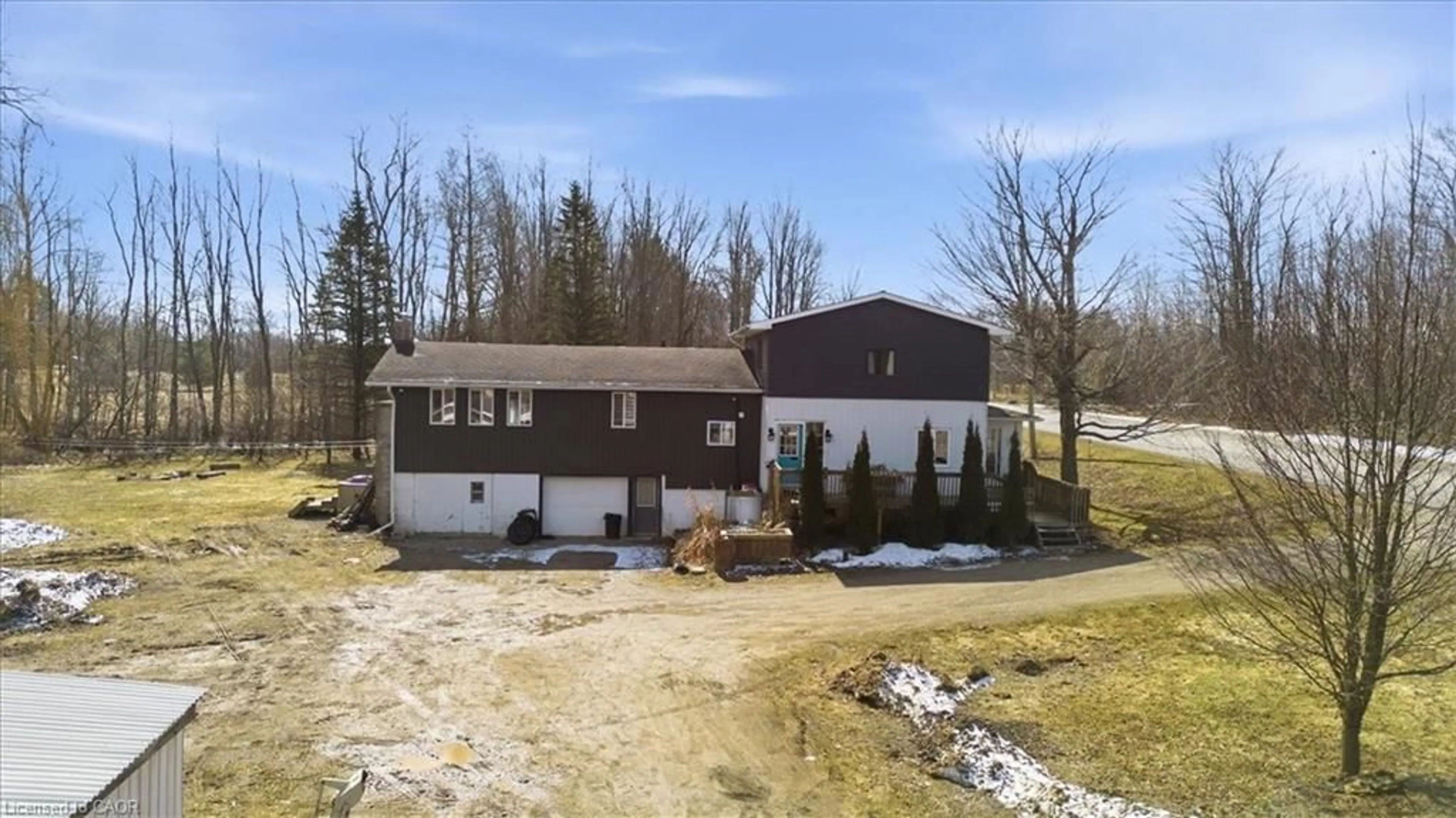 A pic from outside/outdoor area/front of a property/back of a property/a pic from drone, unknown for 303 Bruce Rd 9, South Bruce Peninsula Ontario N0H 2T0