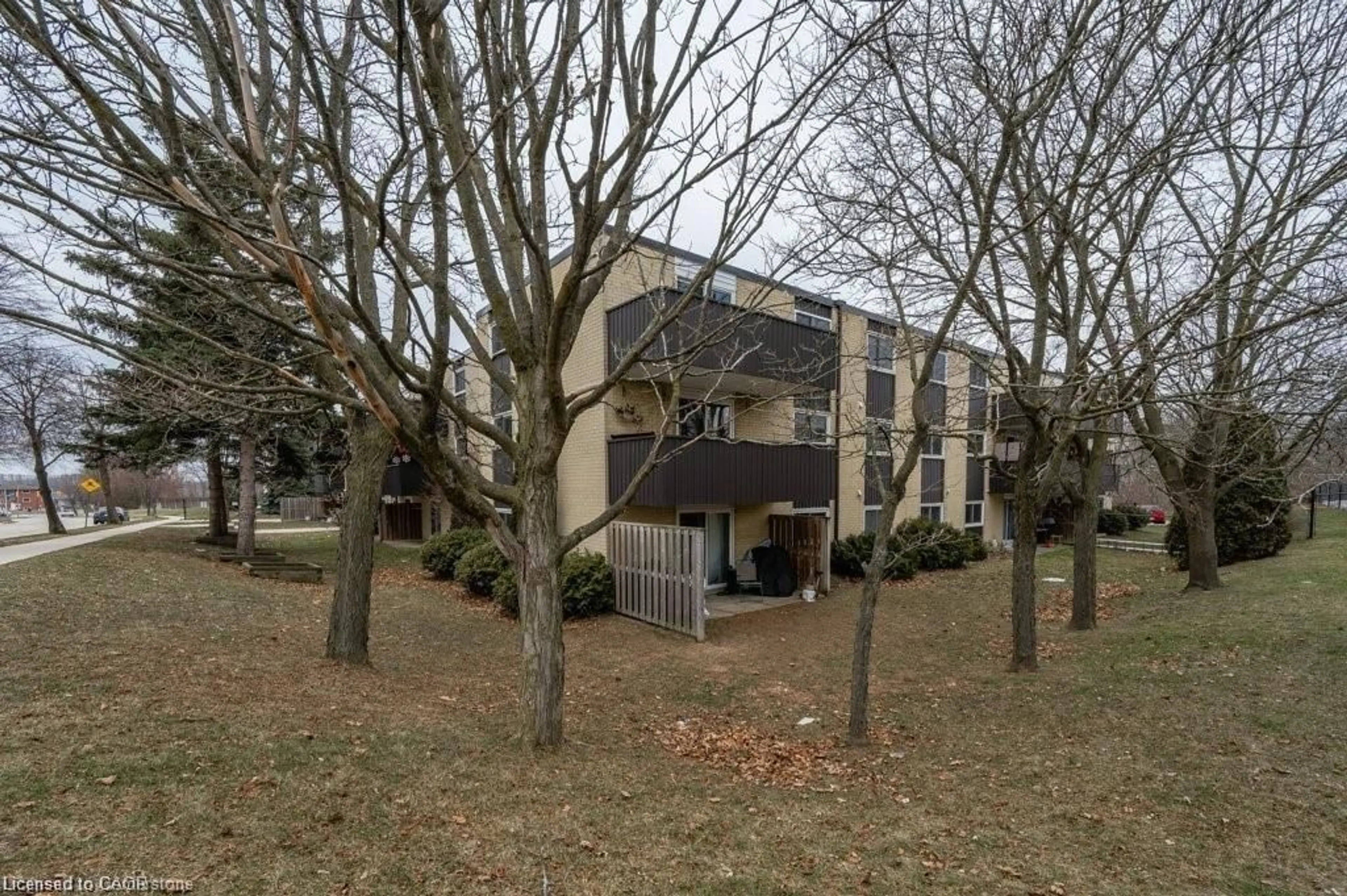 A pic from outside/outdoor area/front of a property/back of a property/a pic from drone, building for 75 Hazelglen Dr #308, Kitchener Ontario N2M 2E2