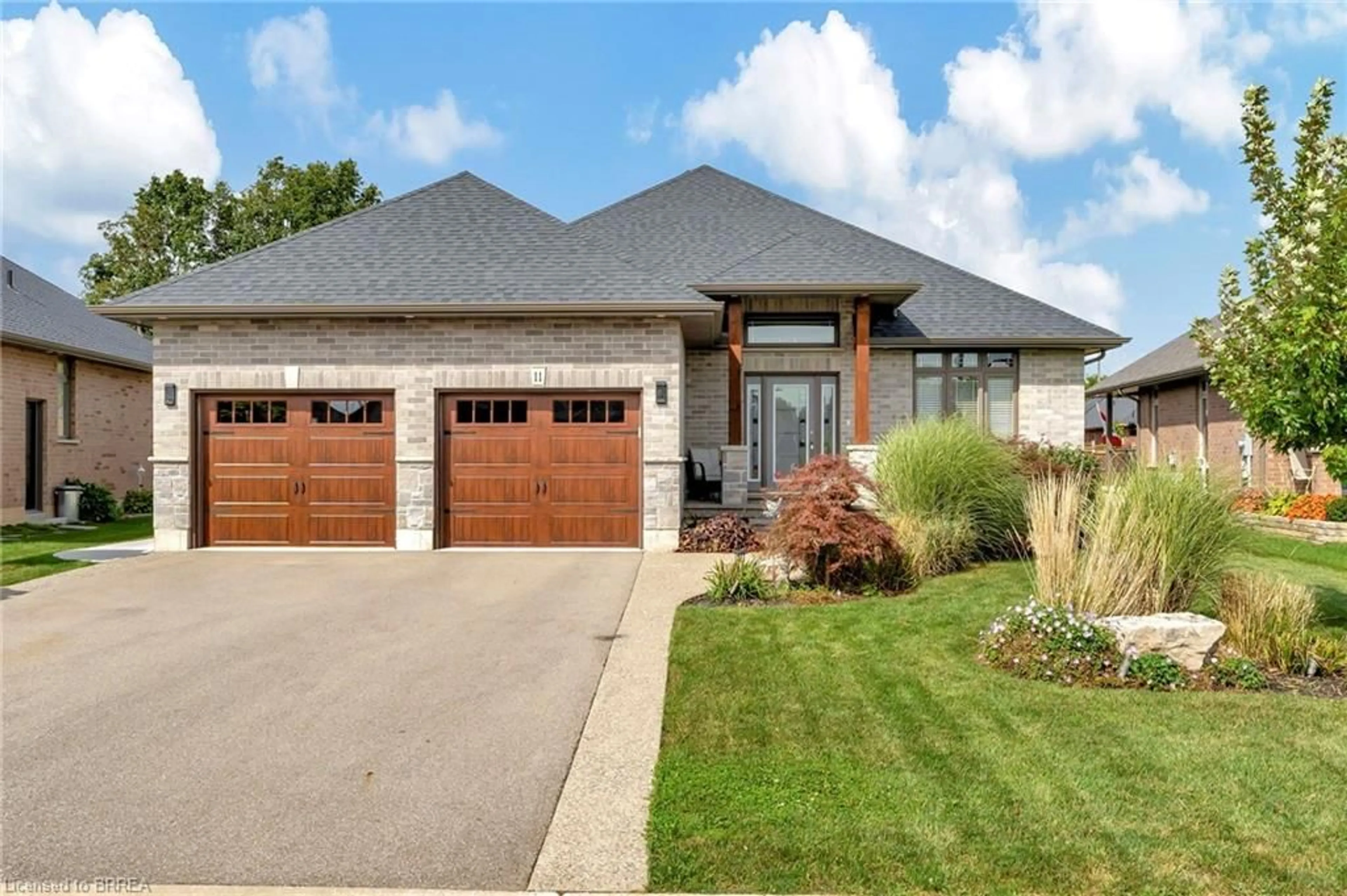 Home with brick exterior material, street for 11 Sycamore Dr, Port Dover Ontario N0A 1N6