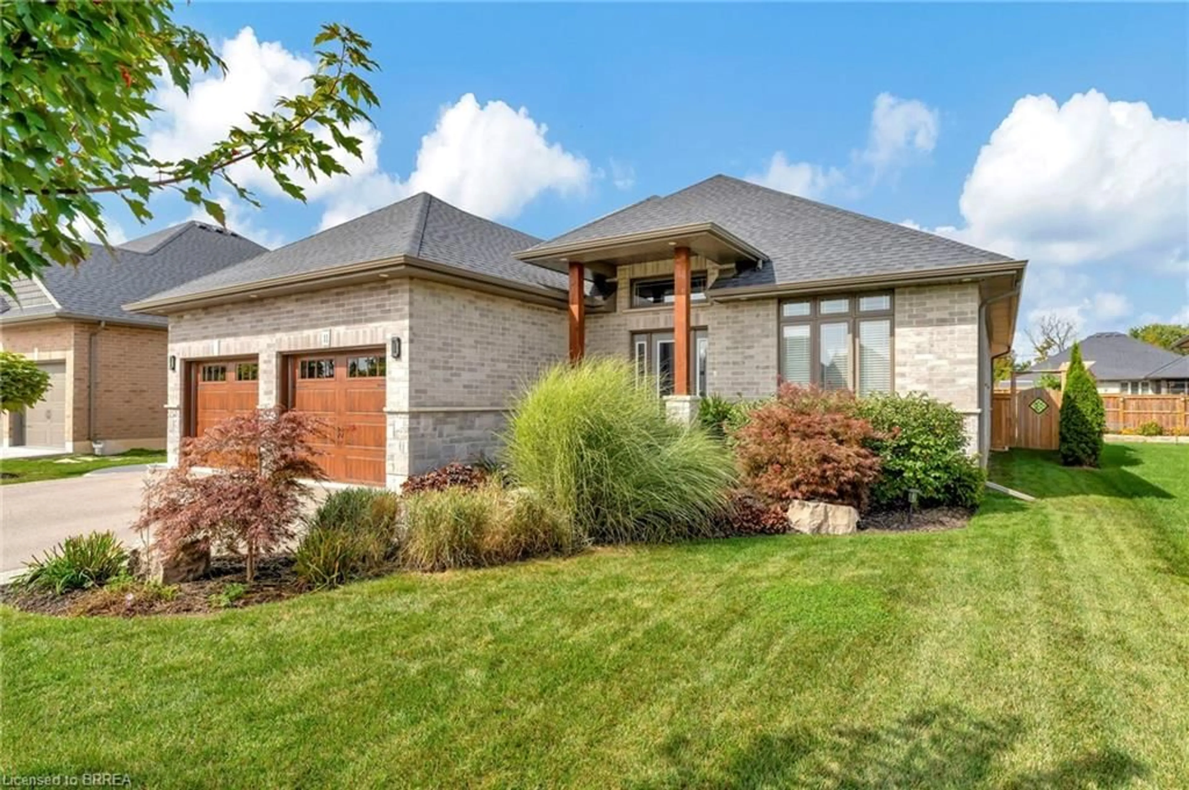 Home with brick exterior material, street for 11 Sycamore Dr, Port Dover Ontario N0A 1N6