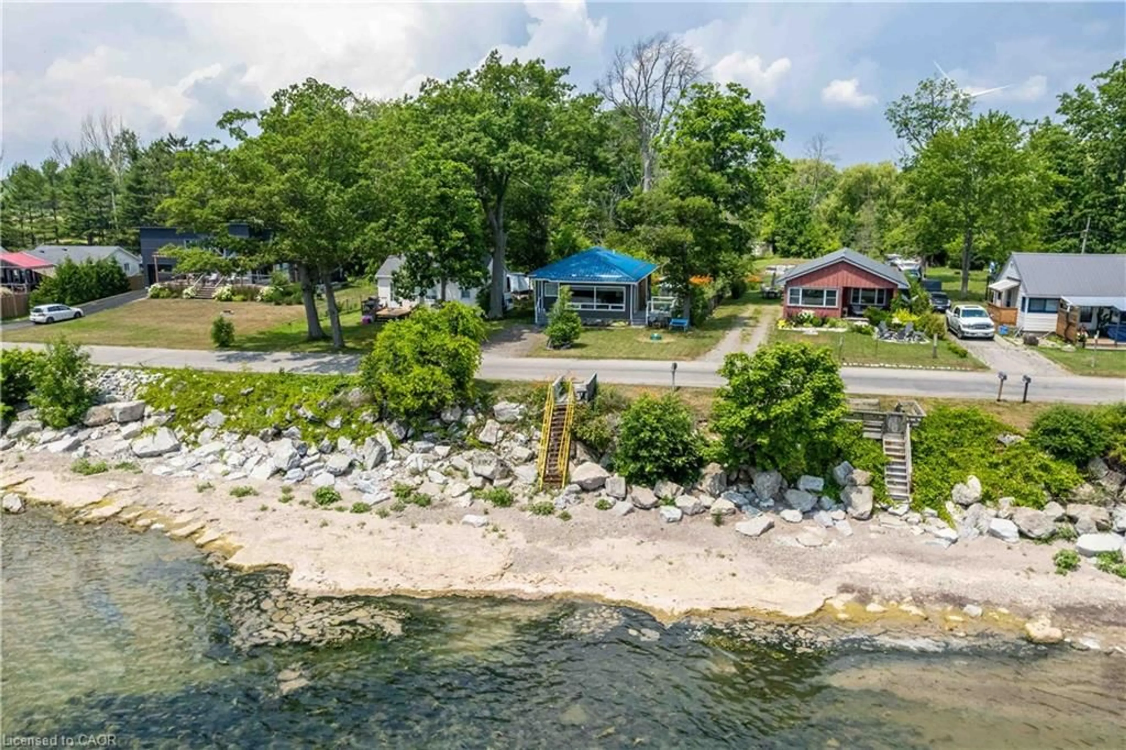 A pic from outside/outdoor area/front of a property/back of a property/a pic from drone, water/lake/river/ocean view for 2399 Lakeshore Rd, Dunnville Ontario N1A 2W8
