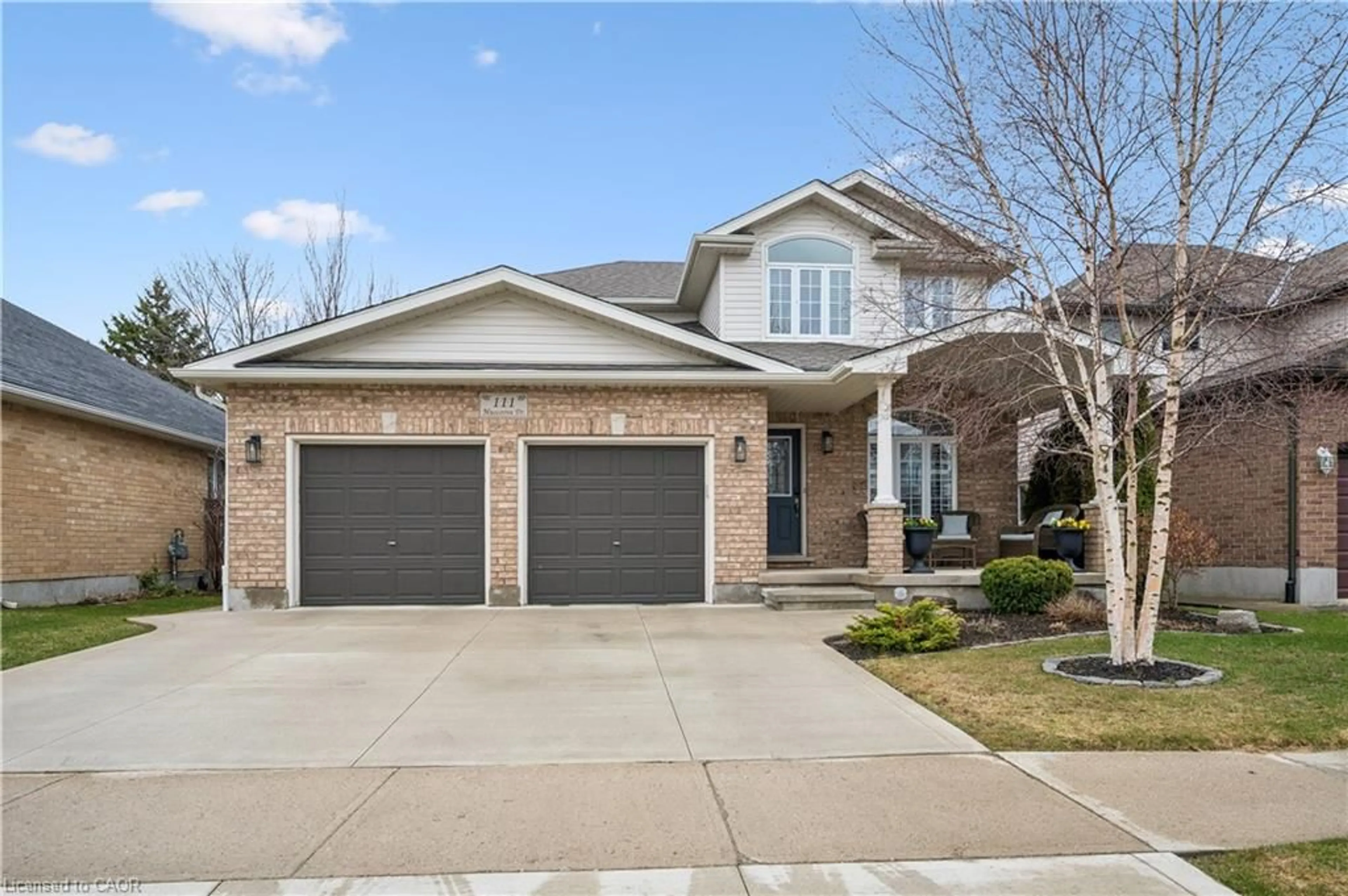 Home with brick exterior material, street for 111 Muscovey Dr, Elmira Ontario N3B 3P7