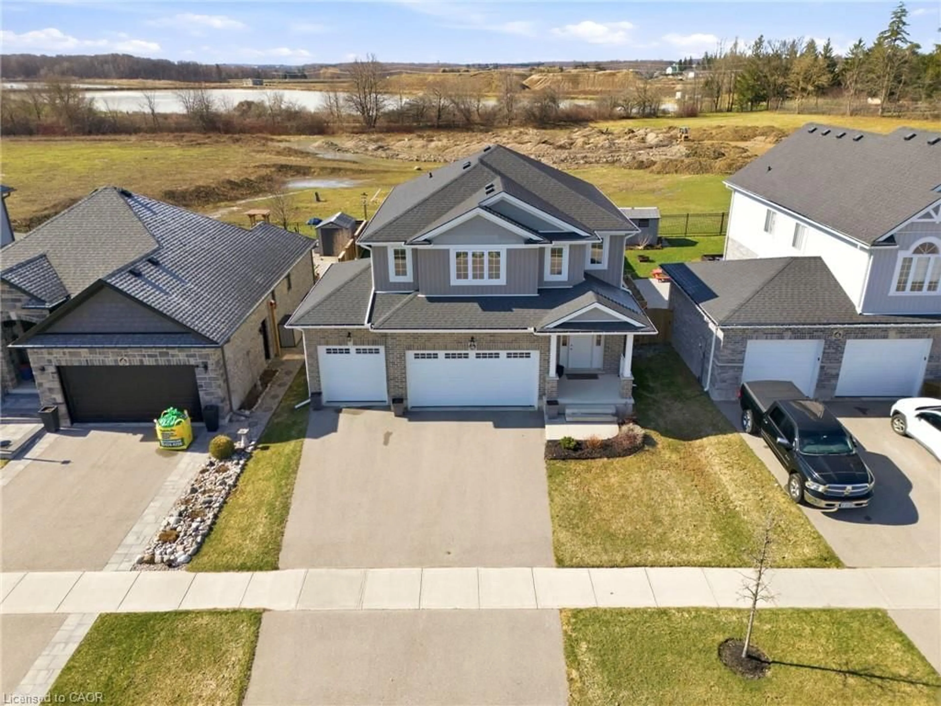 A pic from outside/outdoor area/front of a property/back of a property/a pic from drone, water/lake/river/ocean view for 163 Holley Ave, Tavistock Ontario N0B 2R0