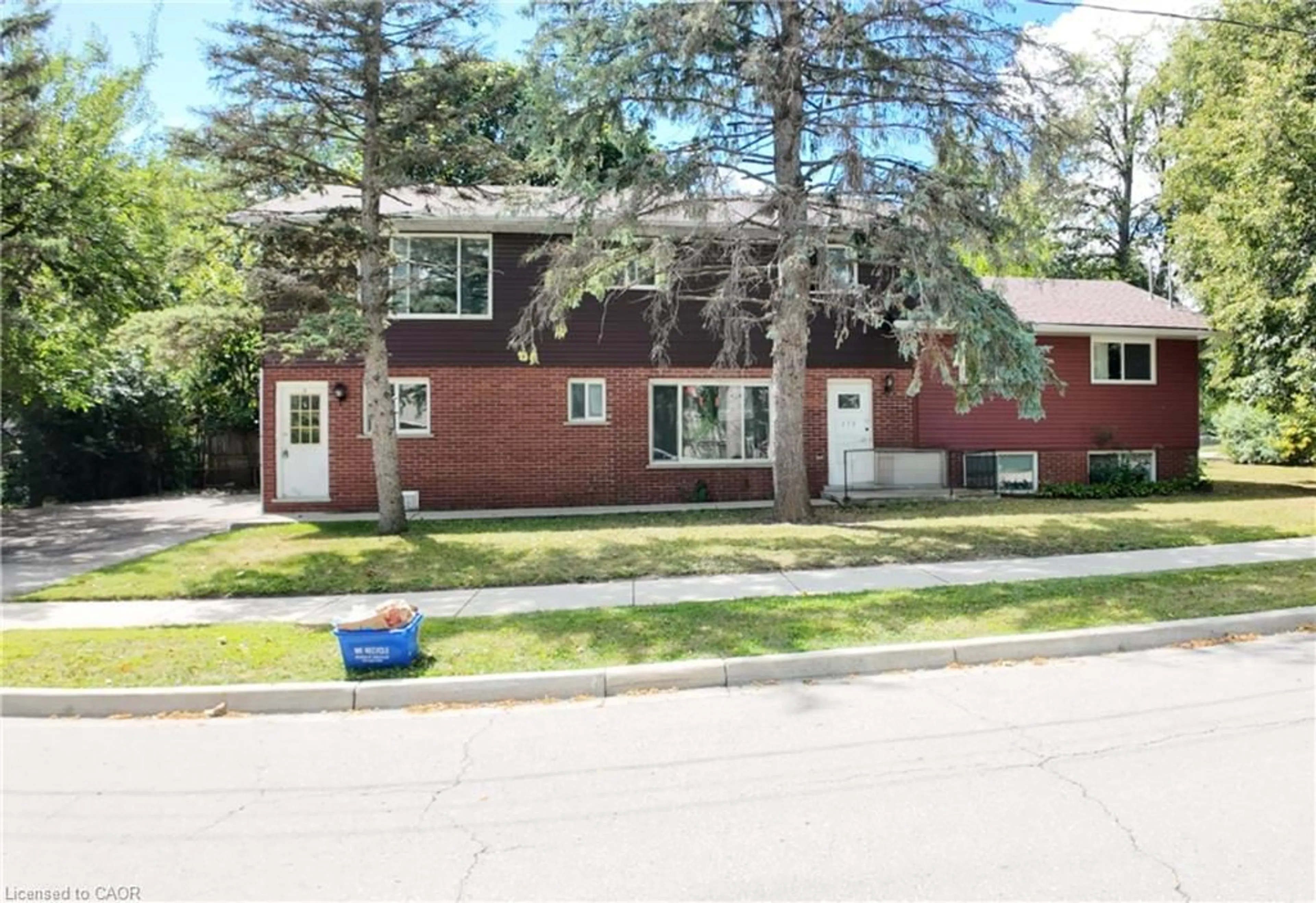 Home with brick exterior material, street for 379 Holly St, Waterloo Ontario N2L 4G5