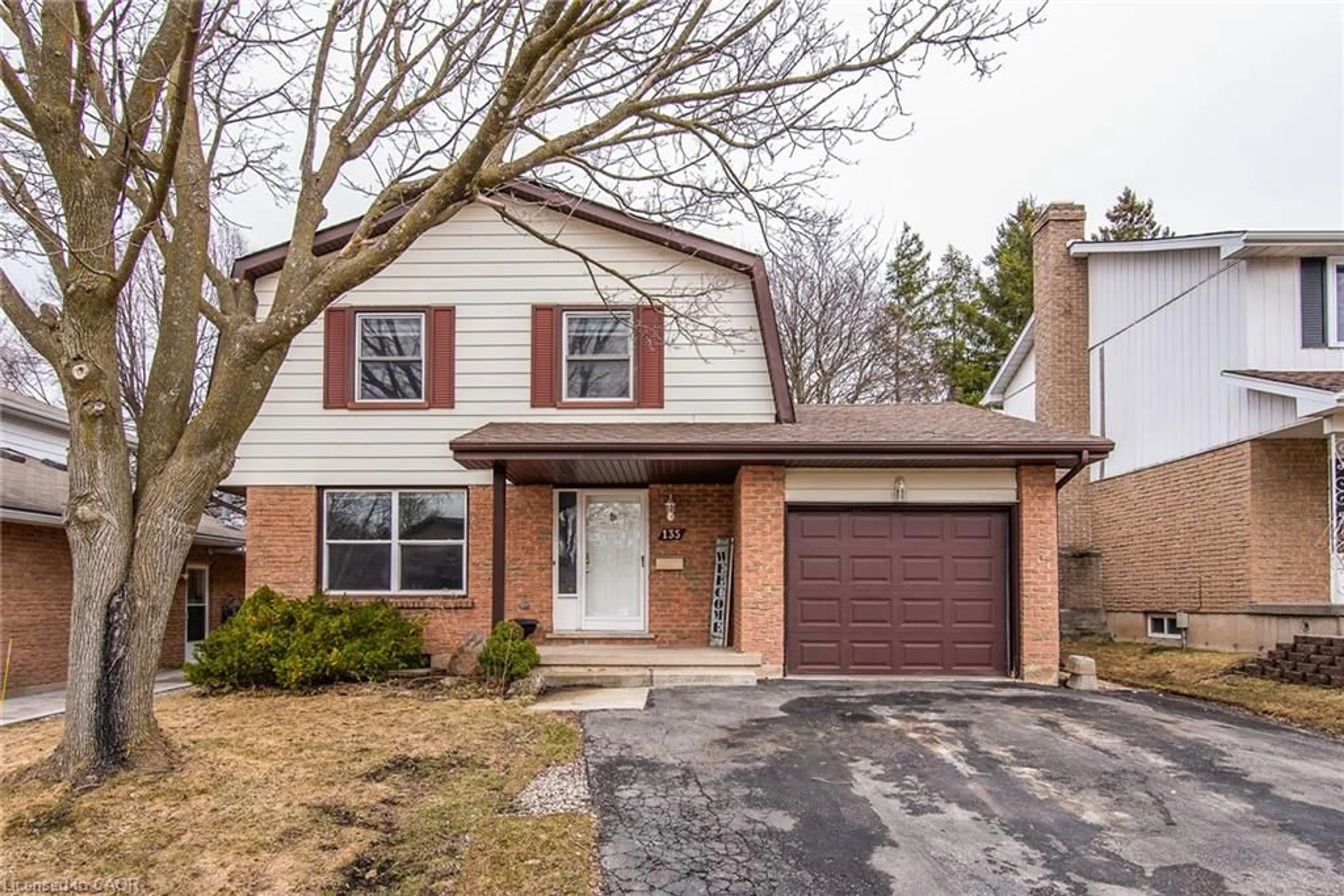 Home with brick exterior material, street for 135 Vintage Cres, Kitchener Ontario N2P 1L1