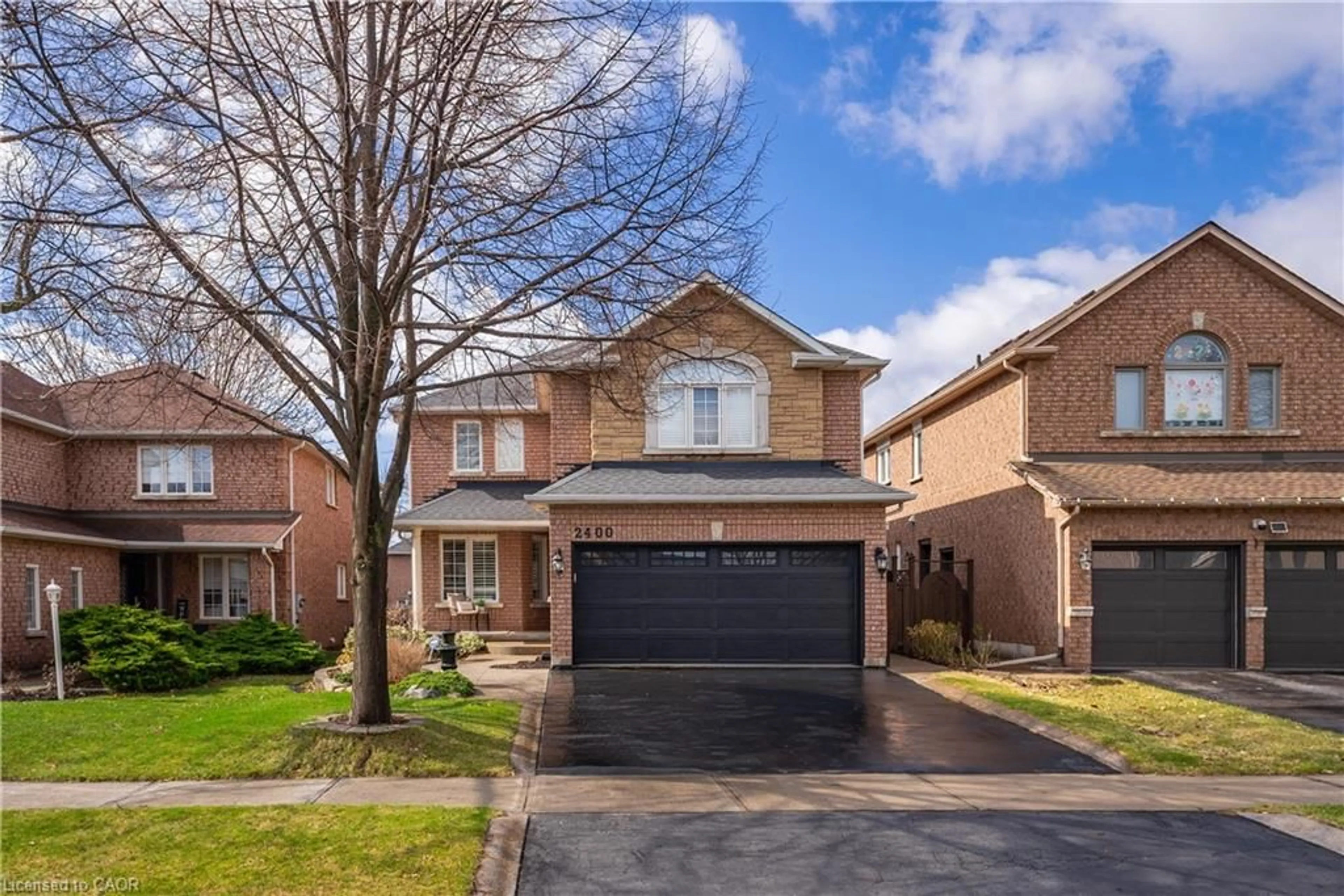 Home with brick exterior material, street for 2400 Eden Valley Dr, Oakville Ontario L6H 6K9