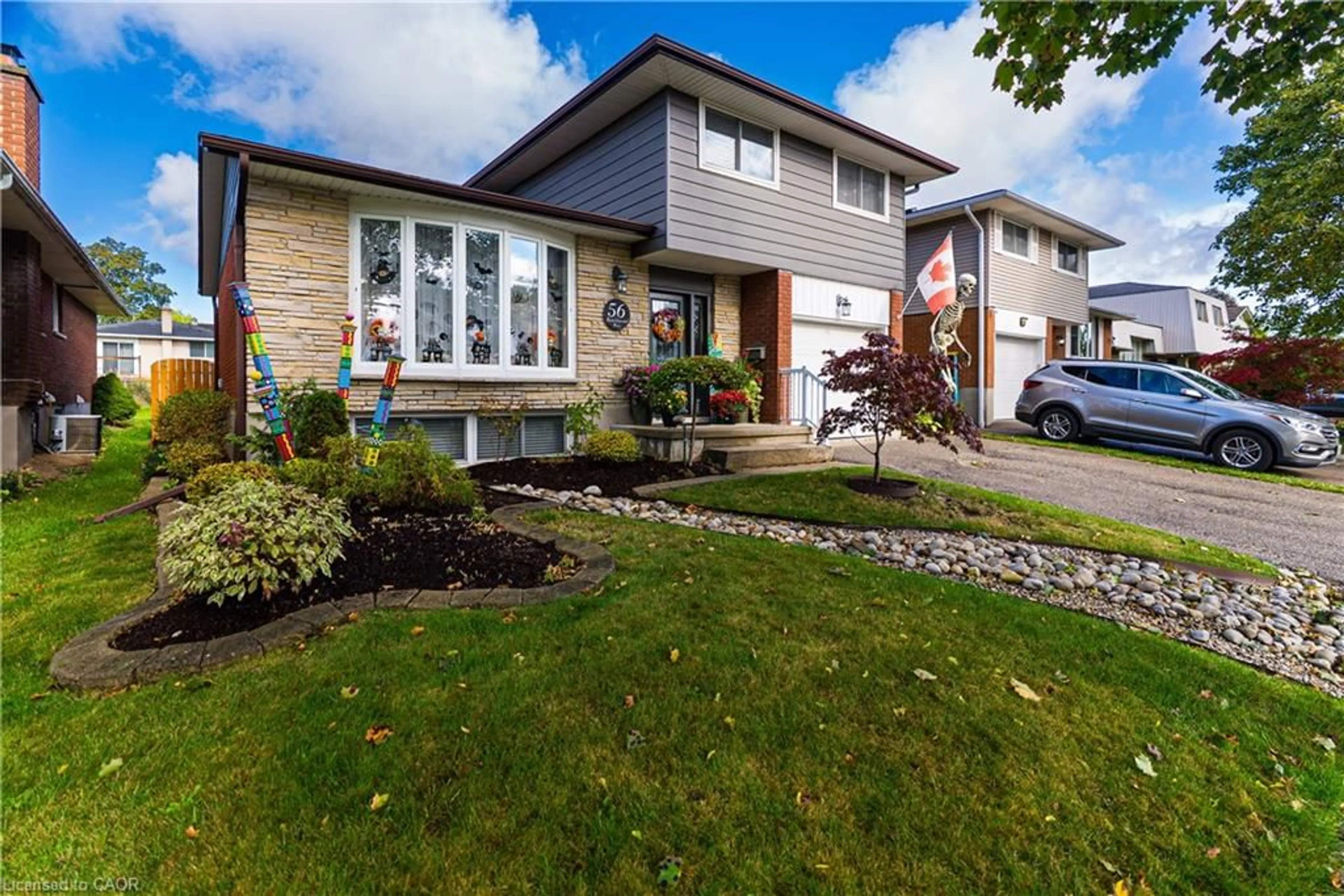 Home with vinyl exterior material, street for 56 Ramblewood Way, Kitchener Ontario N2N 1G7