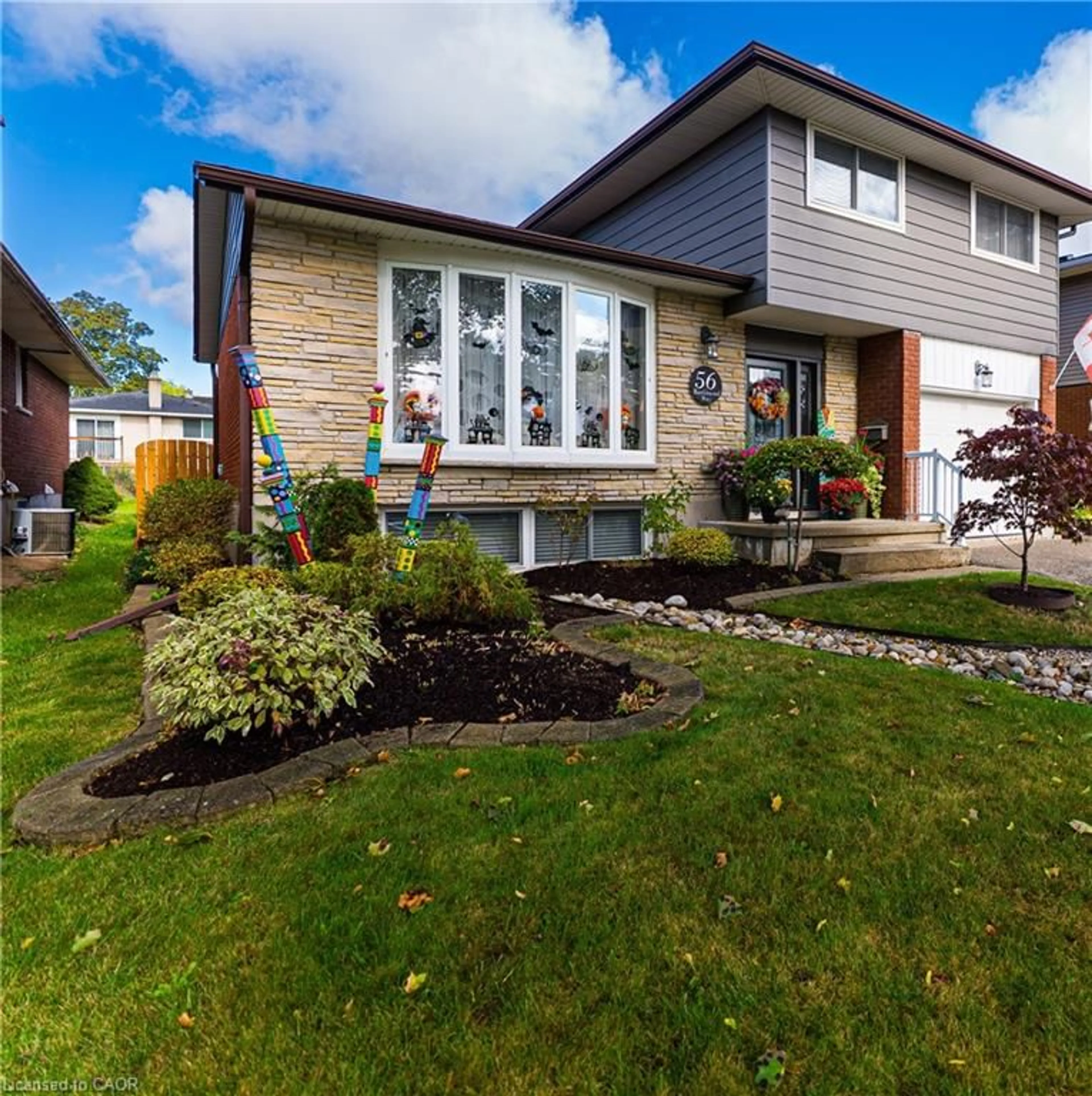 Home with vinyl exterior material, street for 56 Ramblewood Way, Kitchener Ontario N2N 1G7