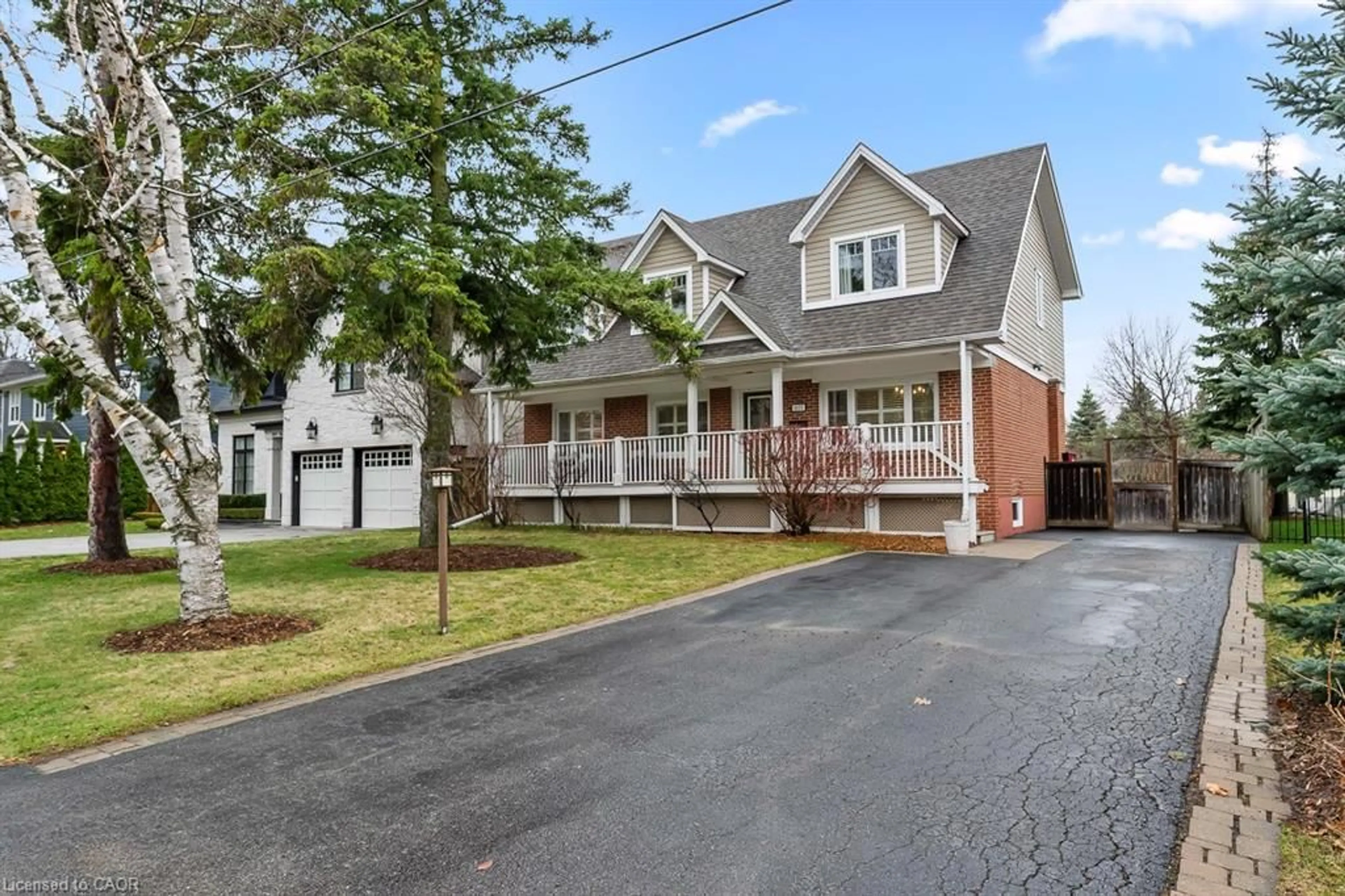 Home with brick exterior material, street for 1071 Melvin Ave, Oakville Ontario L6J 2V8