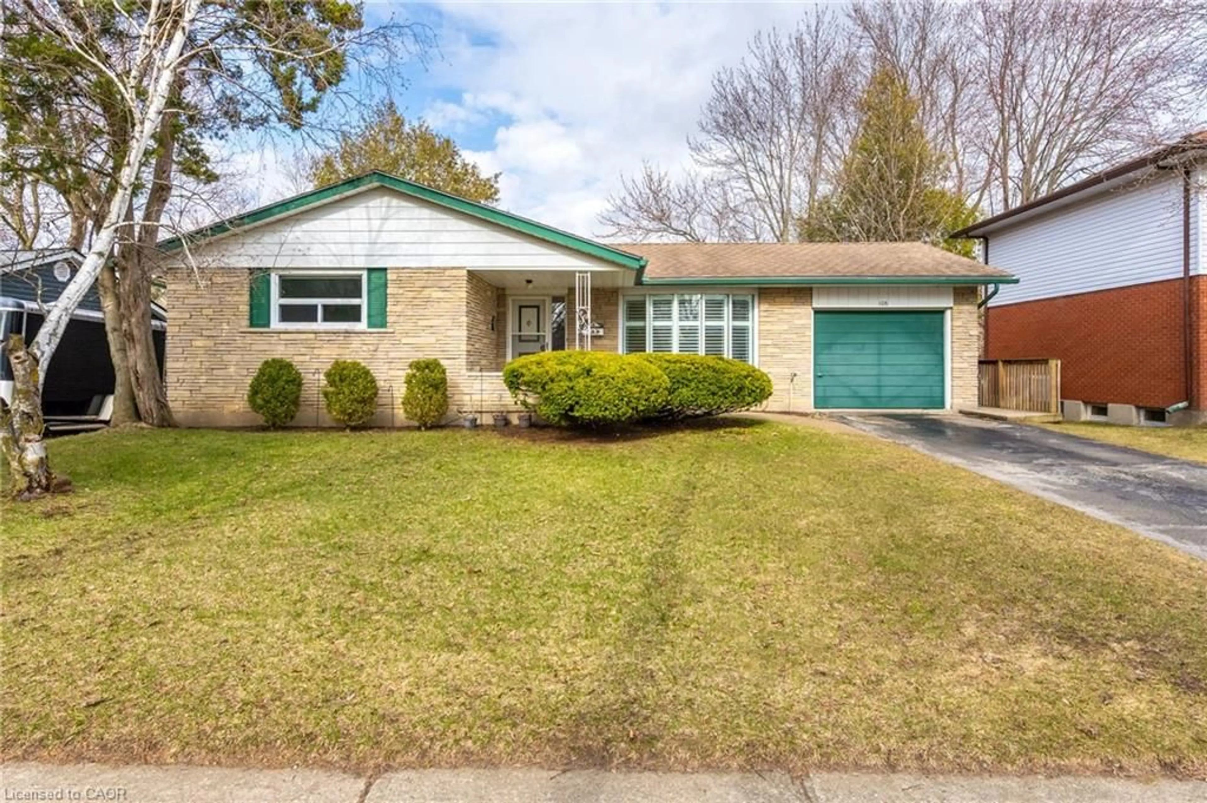 Home with vinyl exterior material, street for 106 Shea Cres, Kitchener Ontario N2E 1E8