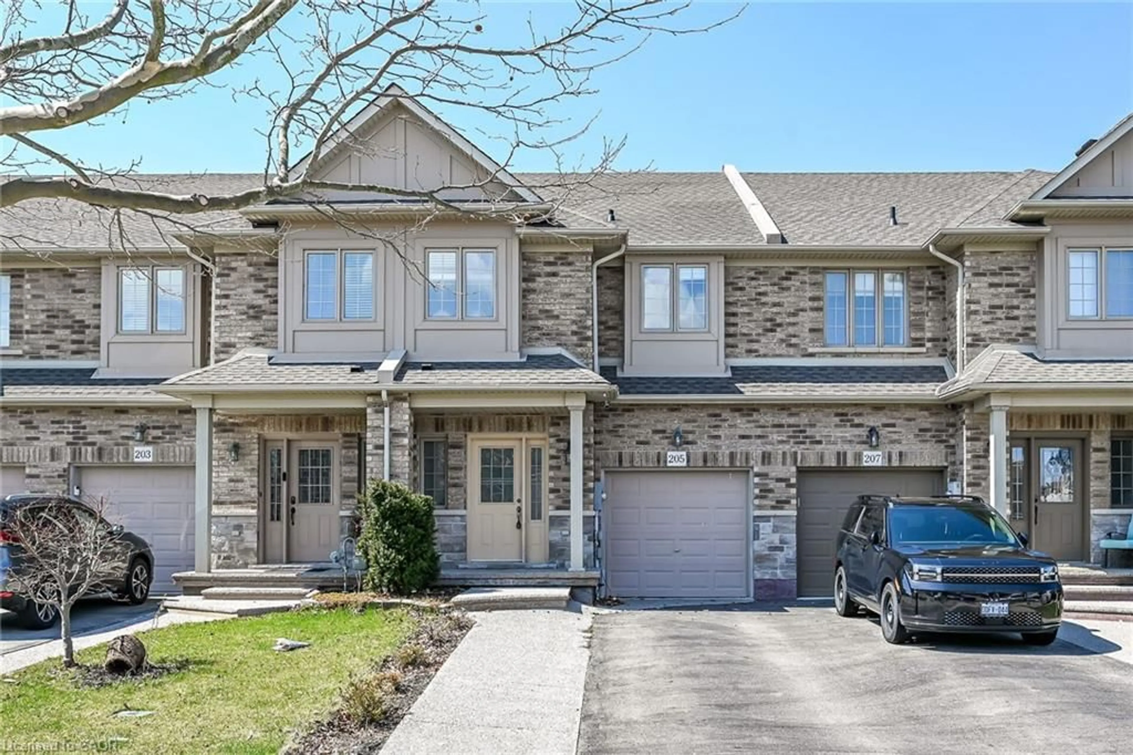 Home with brick exterior material, street for 205 Tanglewood Dr, Binbrook Ontario L0R 1C0