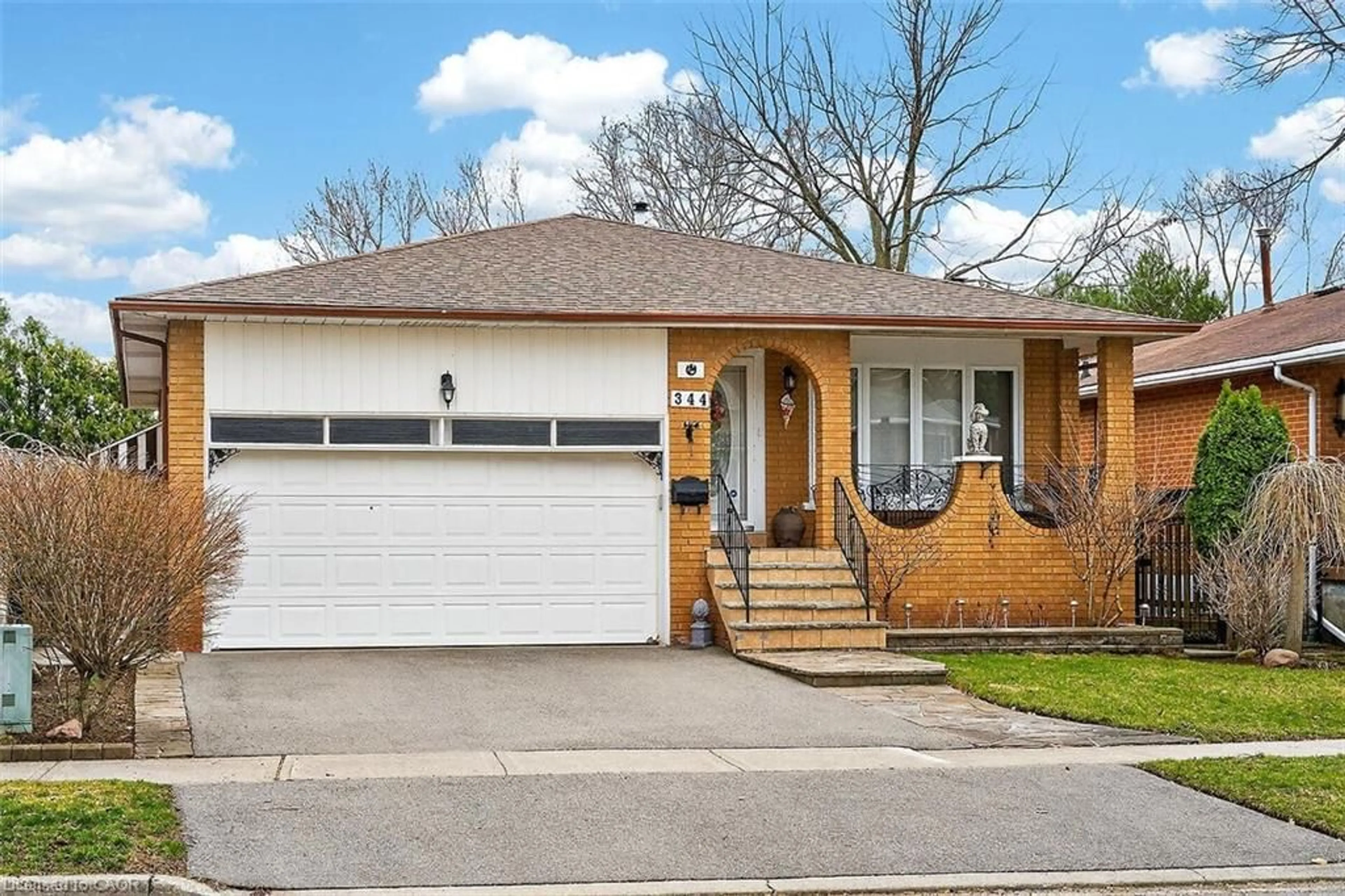 Home with brick exterior material, street for 344 Enfield Rd, Burlington Ontario L7T 4E8