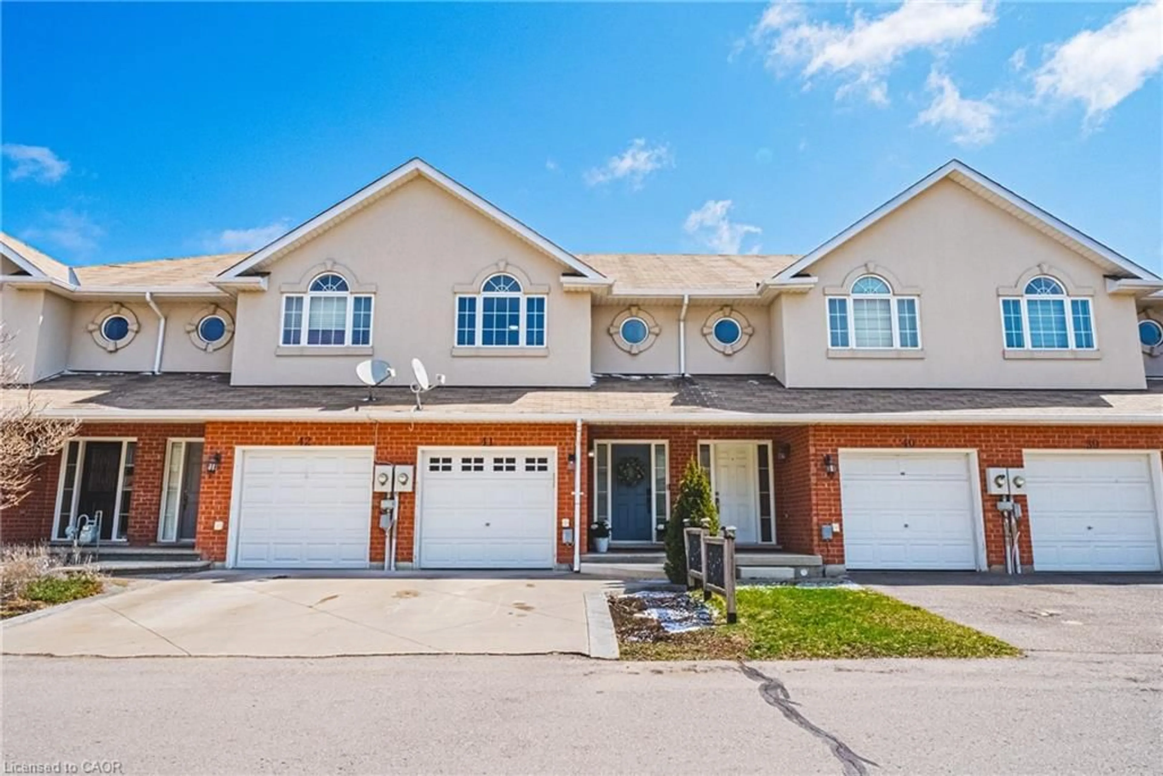 Home with brick exterior material, street for 20 Mcconkey Cres #41, Brantford Ontario N3S 0B8