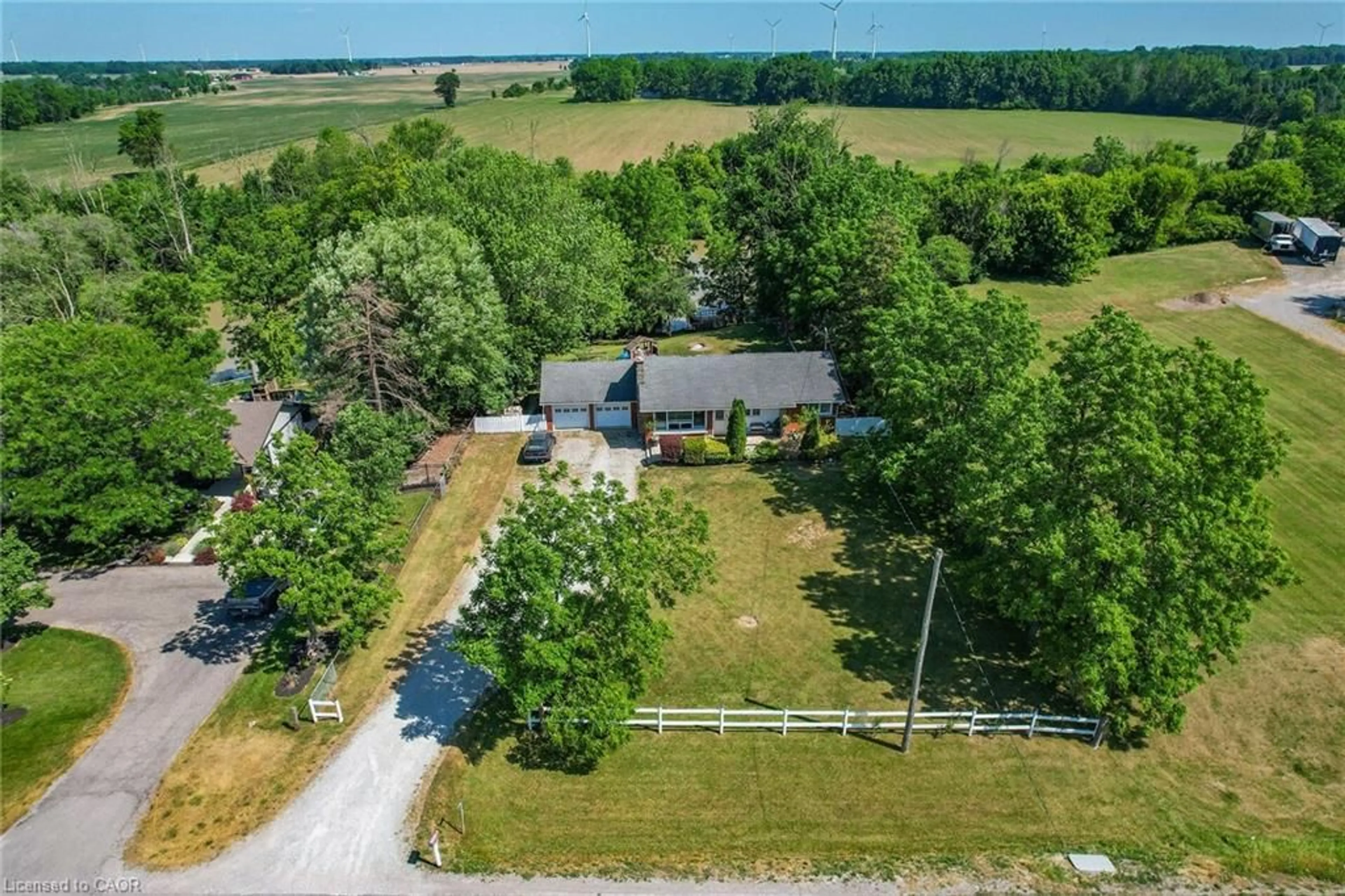 A pic from outside/outdoor area/front of a property/back of a property/a pic from drone, unknown for 73222 #27 Regional Rd, Wellandport Ontario L0R 2J0