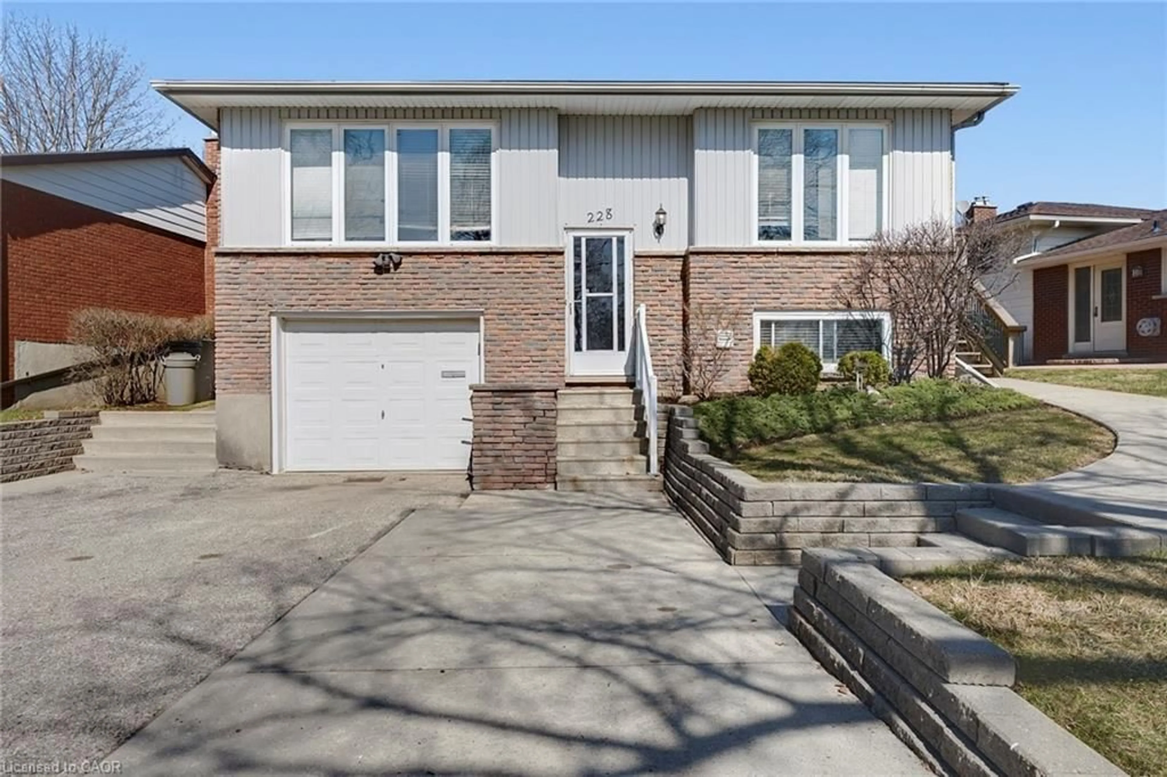 Home with brick exterior material, street for 228 Holborn Dr, Kitchener Ontario N2A 2E8